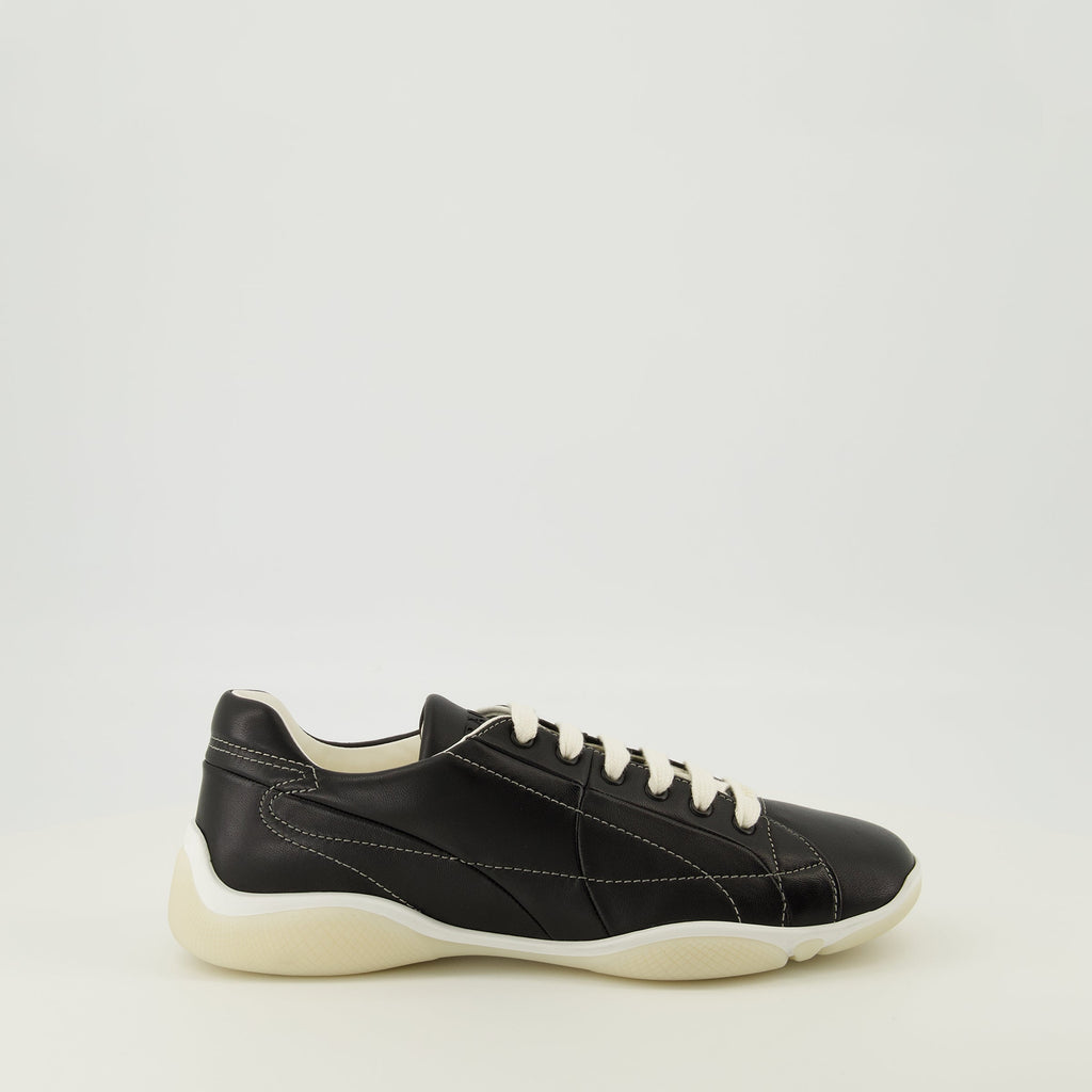 Prada sneakers, black leather footwear, comfort sneakers, rubber sole shoes, stylish lace-up shoes