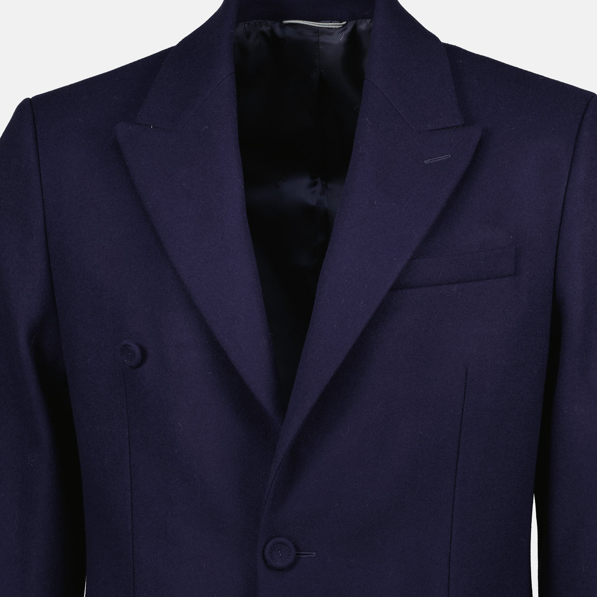 Imagen de un abrigo largo azul marino de Dior para hombres - Temporada Primavera-Verano 2026 - Vista detalle 1