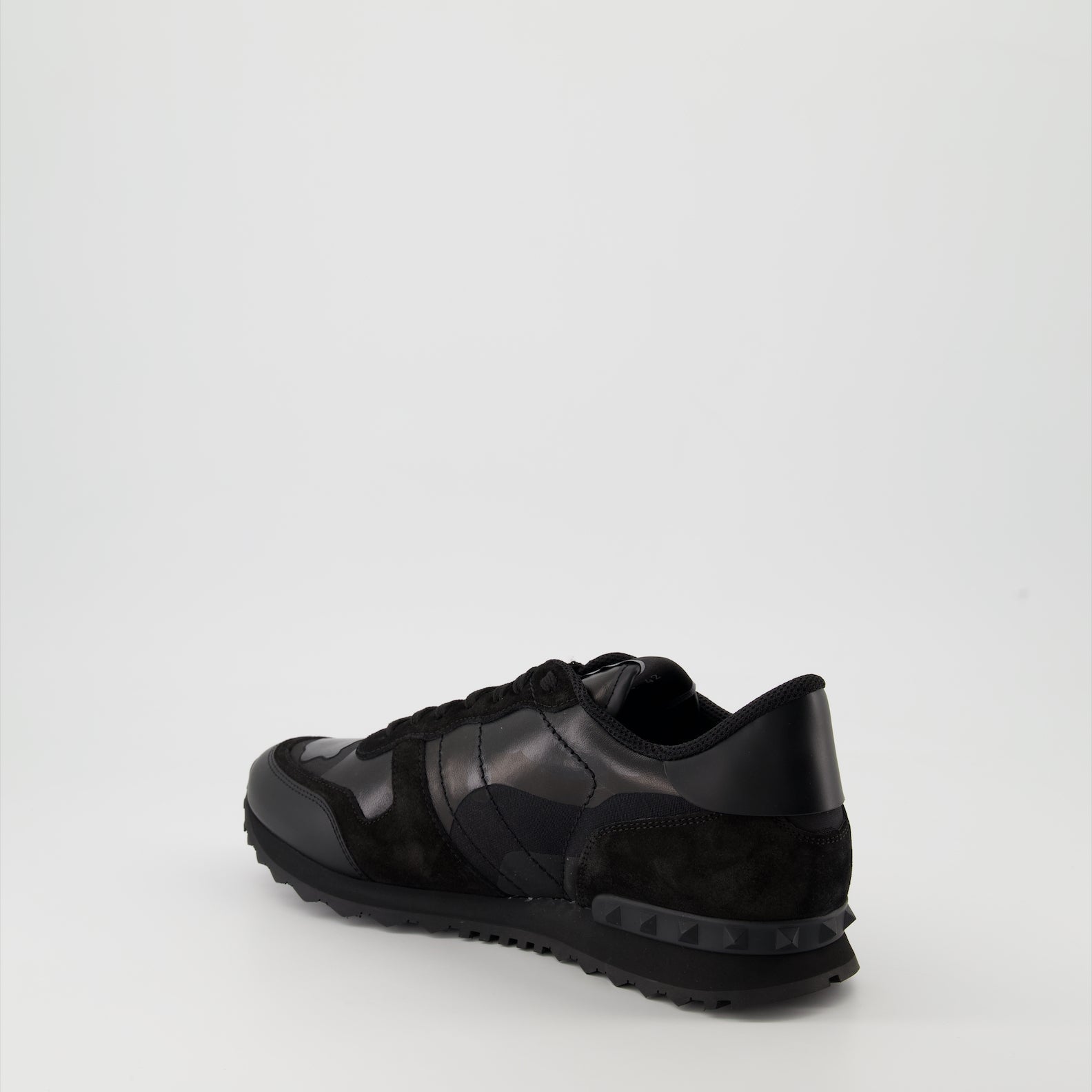 Valentino Garavani sneakers, Rockrunner leather sneakers, luxury footwear, black suede sneakers, high-end sneakers