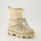 Image of Peak Beige Shearling Boots by Moncler for Women - Season Autumn-Winter 2025 - Front Right Three-Quarter View