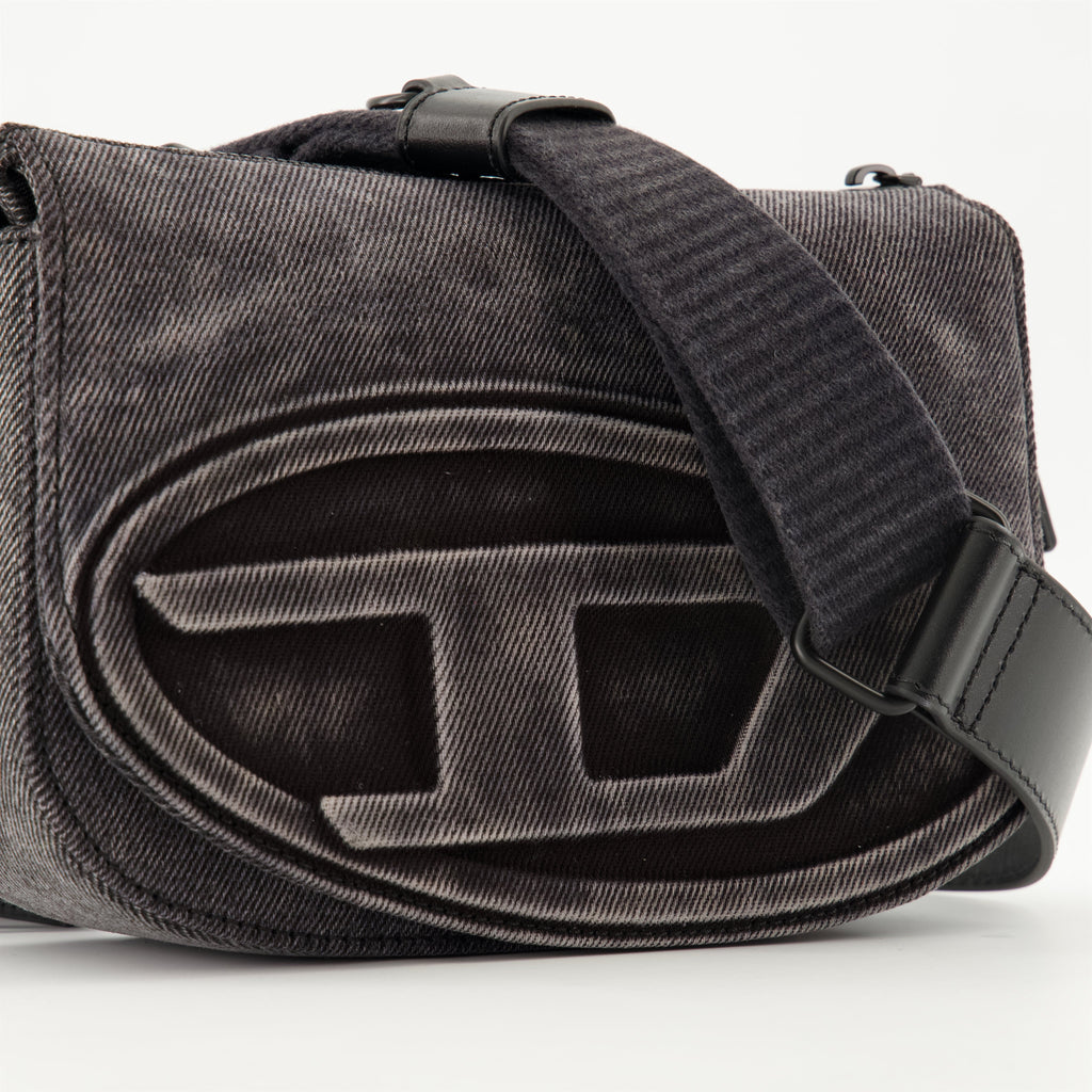 denim camera bag, adjustable shoulder strap, unisex accessory, oval D logo, Spring-Summer 2025 collection