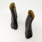 black leather boots, MM6 footwear, fall-winter 2024, ankle boots, leather sole female