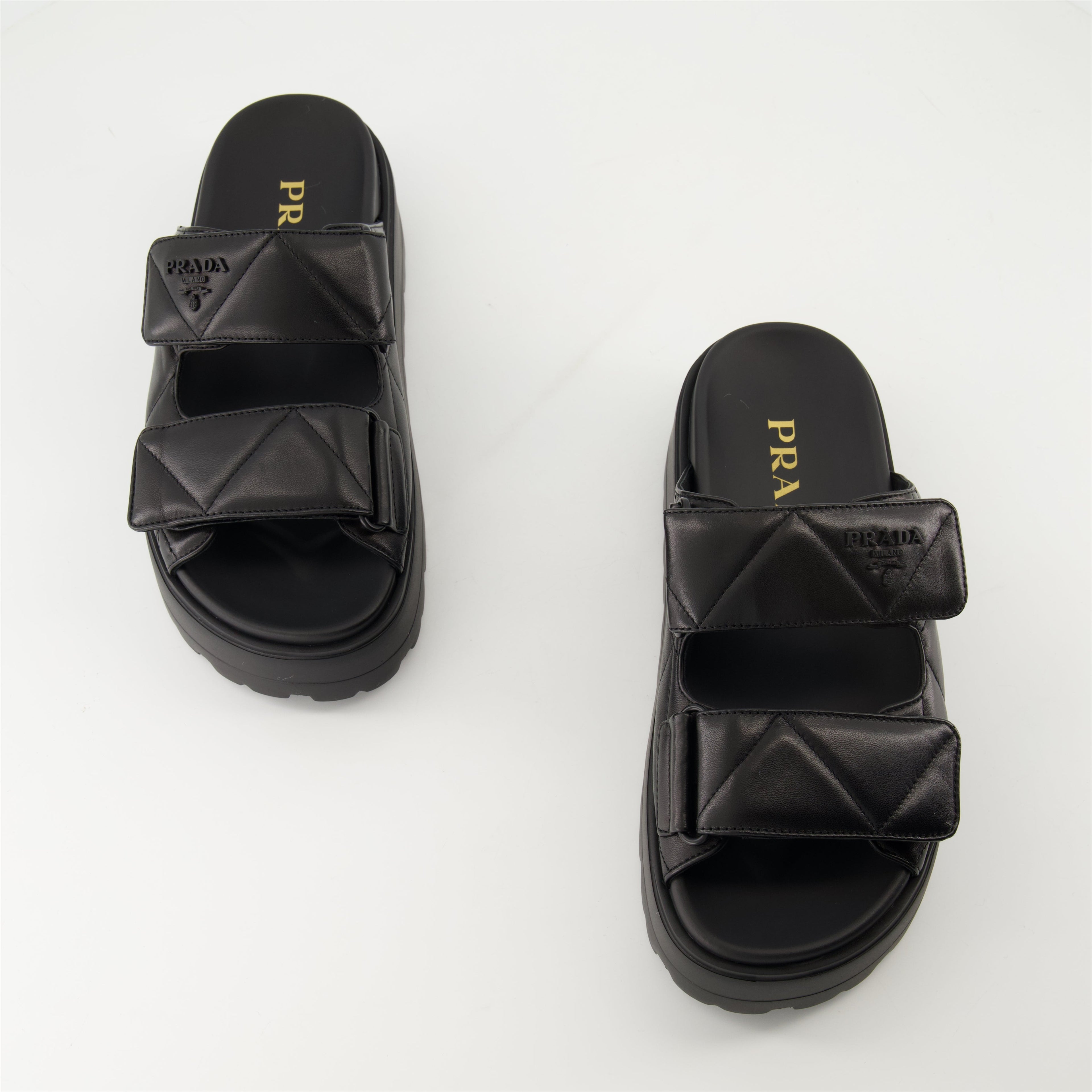 black mules, nappa leather footwear, quilted mules, Prada footwear, women's mules
