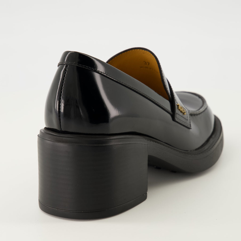 black leather moccasins, Tod's footwear, elegant slip-on shoes, autumn winter collection, women's moccasins