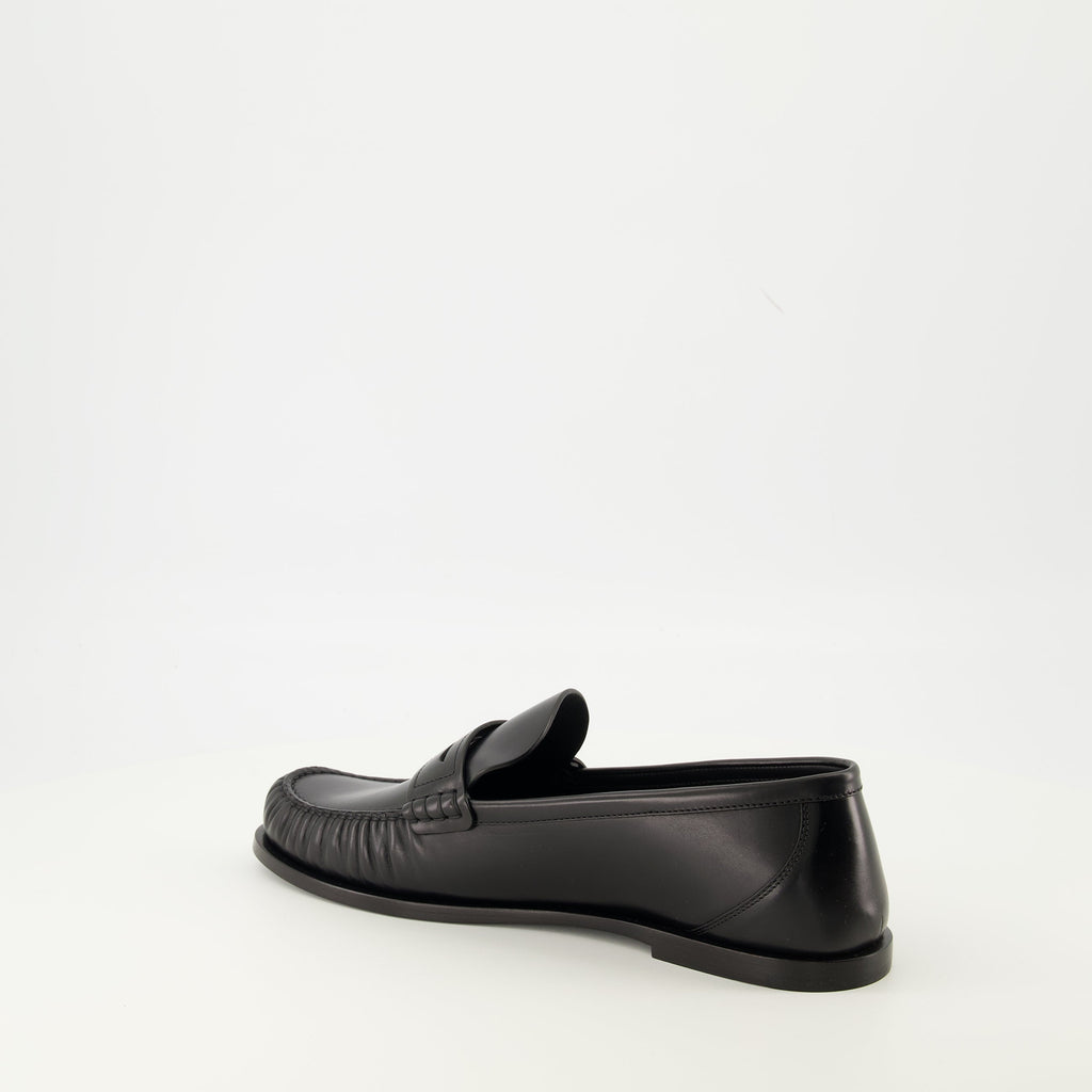 Saint Laurent loafers, black leather shoes, luxury footwear, rounded toe loafers, men's slip-on shoes