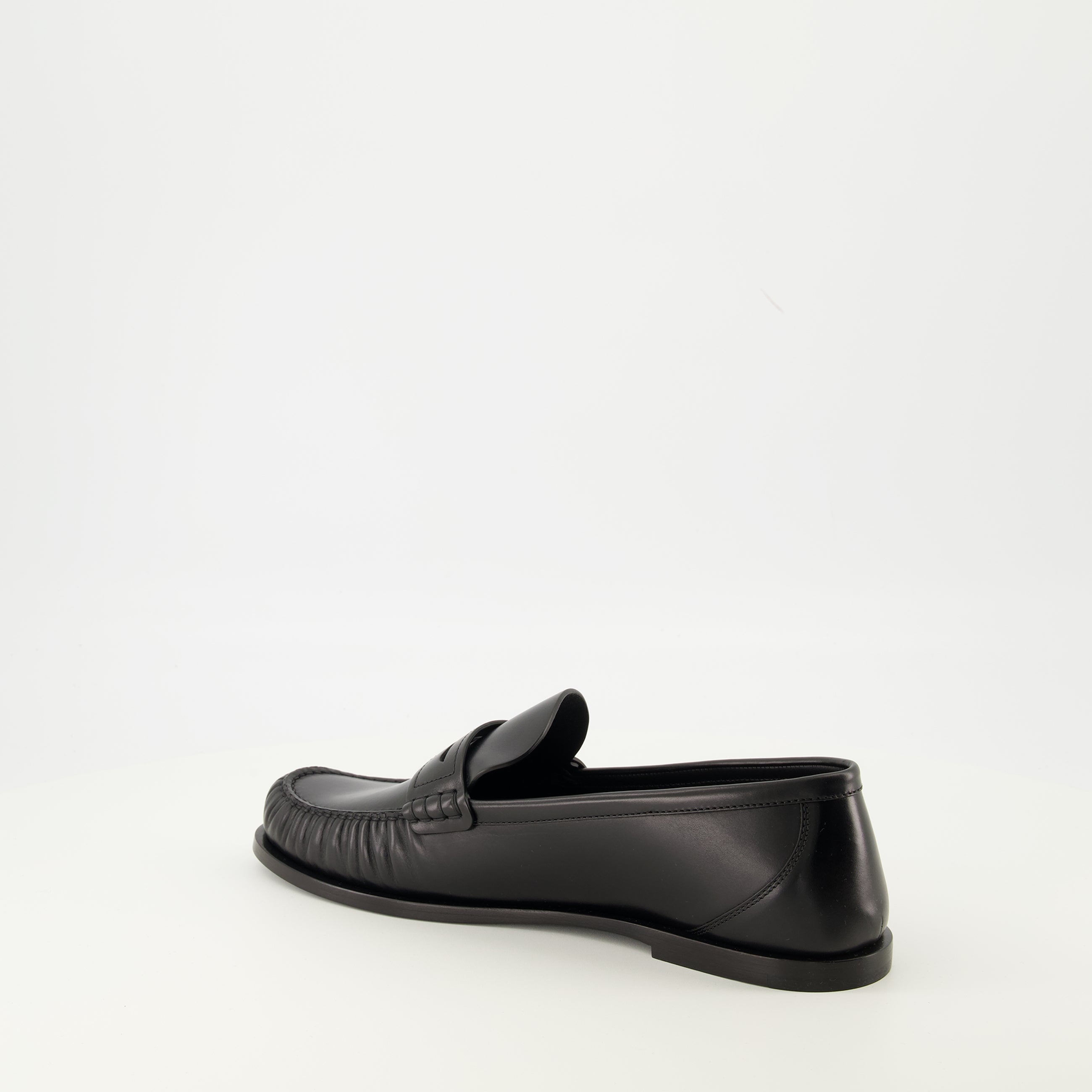 Saint Laurent loafers, black leather shoes, luxury footwear, rounded toe loafers, men's slip-on shoes