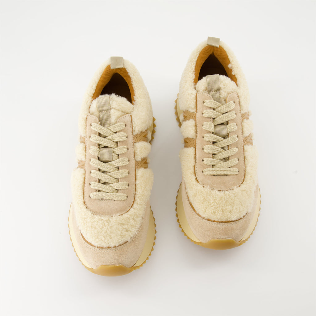 - Shearling sneakers- Moncler AW 2024- Luxury footwear- Beige suede sneakers- High-end casual shoes