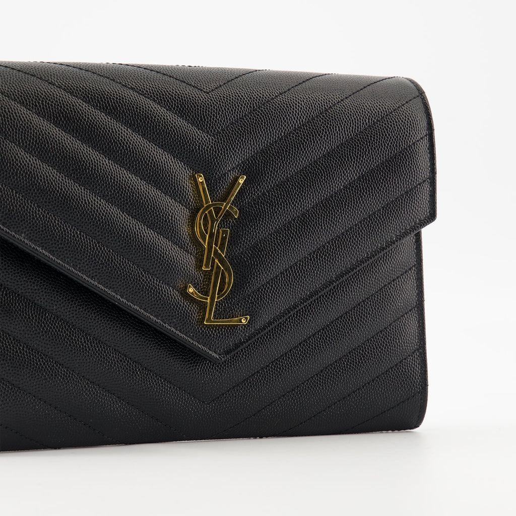 Cassandre pouch, Saint Laurent accessory, black leather pouch, designer handbag, stylish wristlet