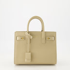 beige day bag, Saint Laurent bag, grained leather bag, designer accessories, elegant handbag