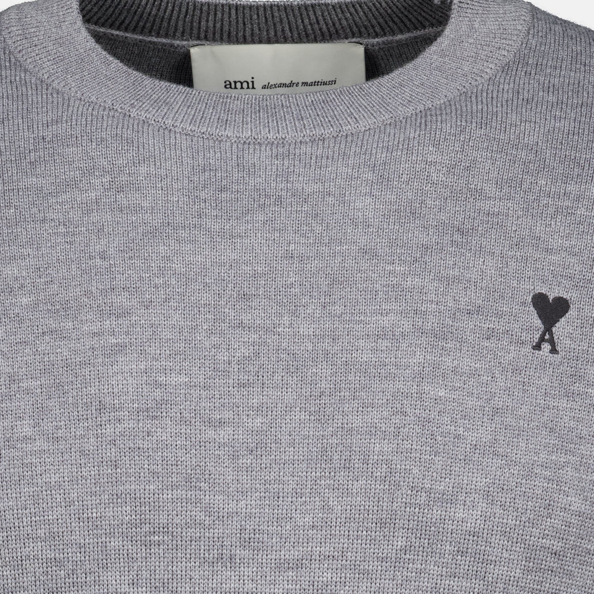 Maglione in lana grigia con logo ricamato