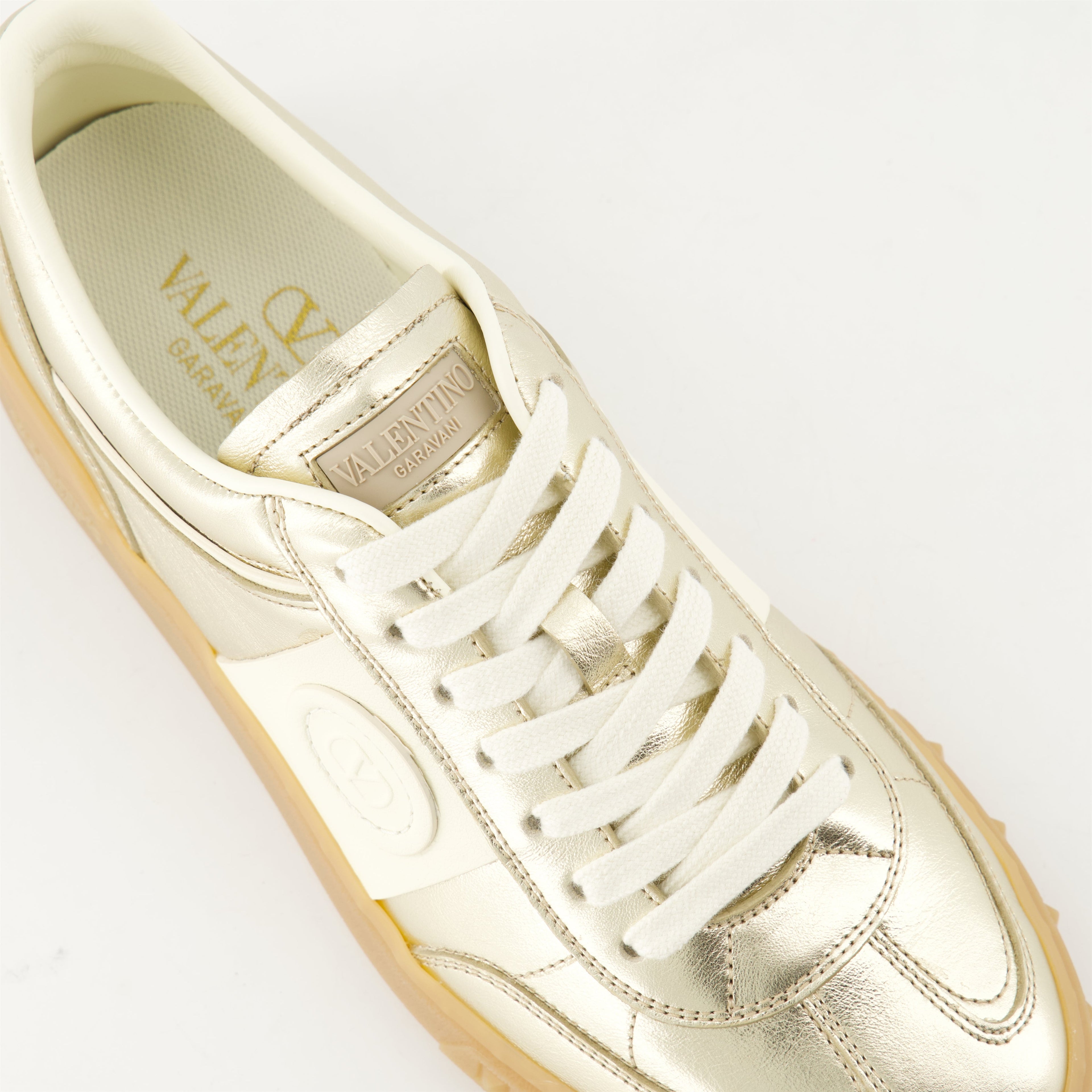 UpVillage Sneakers, Valentino Garavani, metallic gold sneakers, textured leather shoes, contemporary footwear