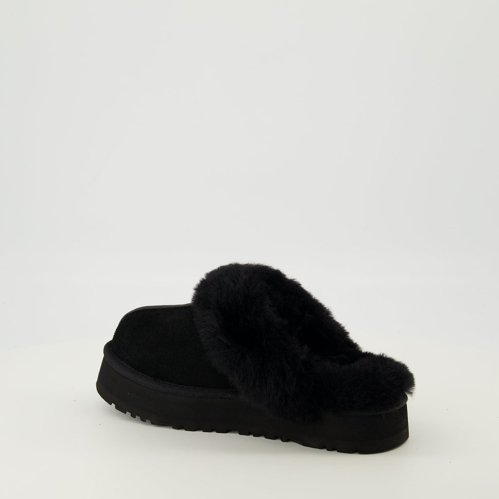Image of Disquette Black Mules by Ugg for Women - Season Spring-Summer 2026 - Back Right Three-Quarter View