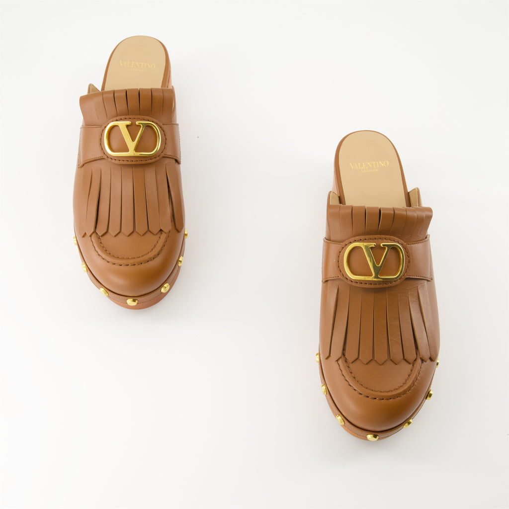 leather clogs, VLogo shoes, luxury footwear, fringe design, Italian fashion