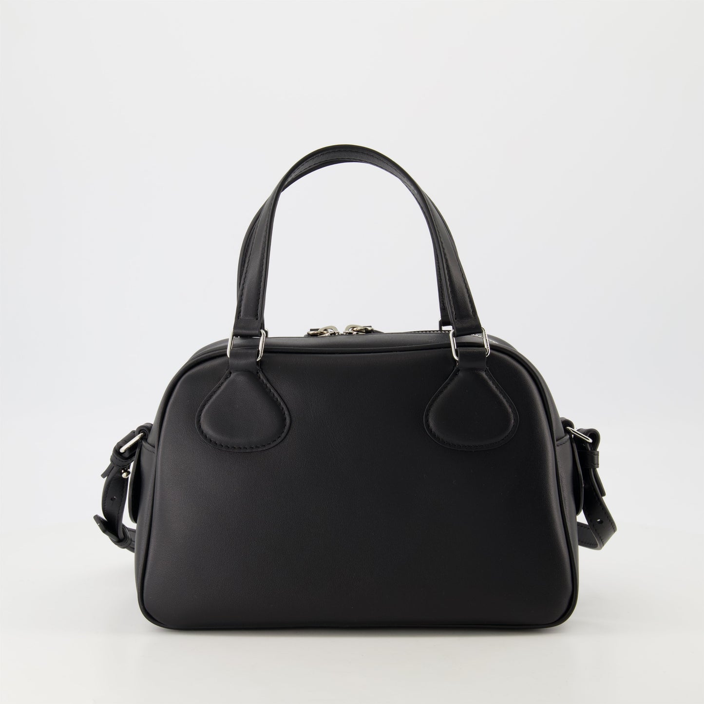 black leather bag, unisex bowling bag, Courrèges leather bag, luxury accessories, designer bags