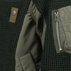 Image d'un pull bimatière bleu et vert de Sacai pour homme - Saison automne-hiver 2024 - Détail 1