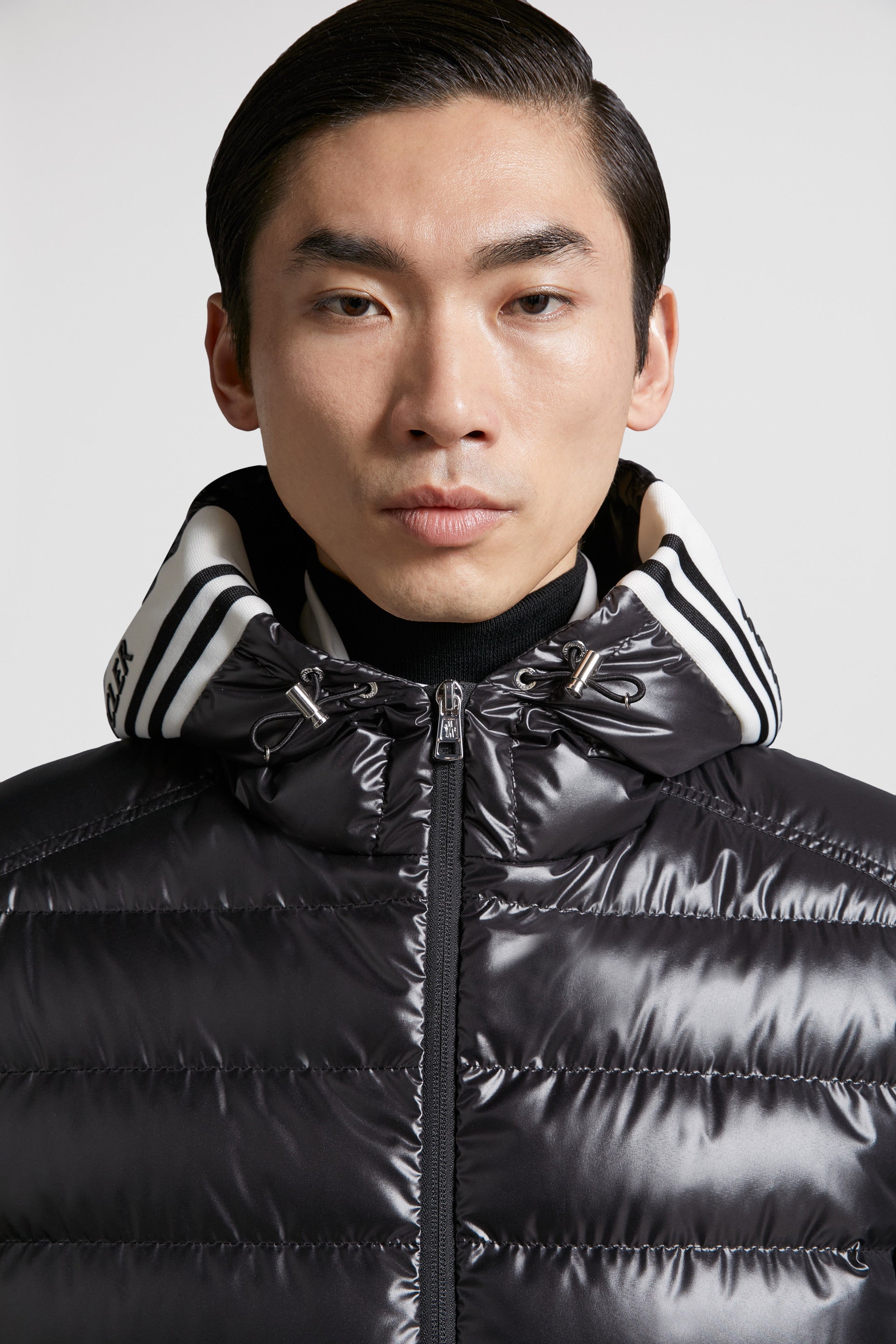 luxury down jacket, black nylon jacket, Moncler Cornour, premium outerwear, sophisticated jacket