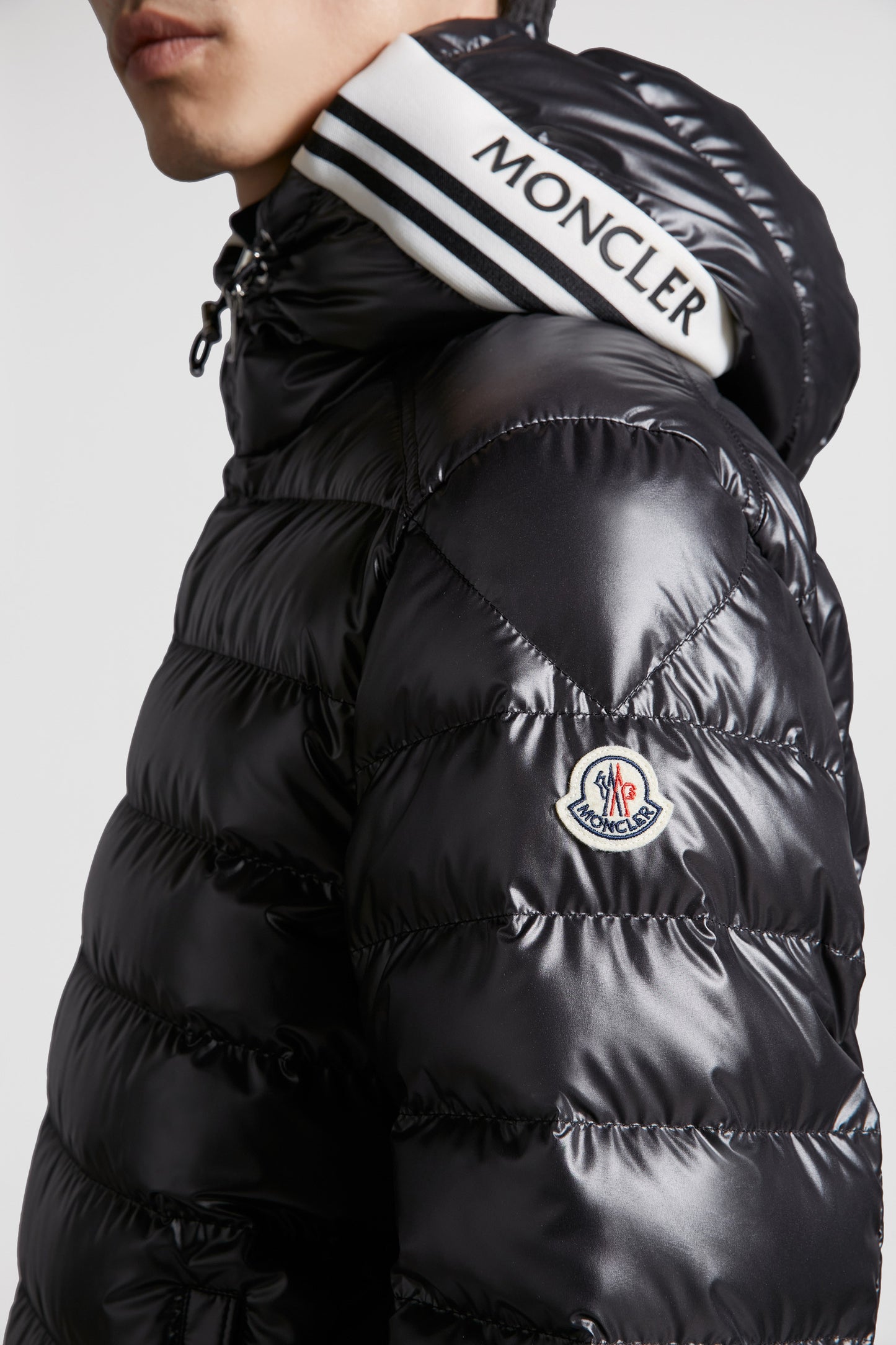 luxury down jacket, black nylon jacket, Moncler Cornour, premium outerwear, sophisticated jacket