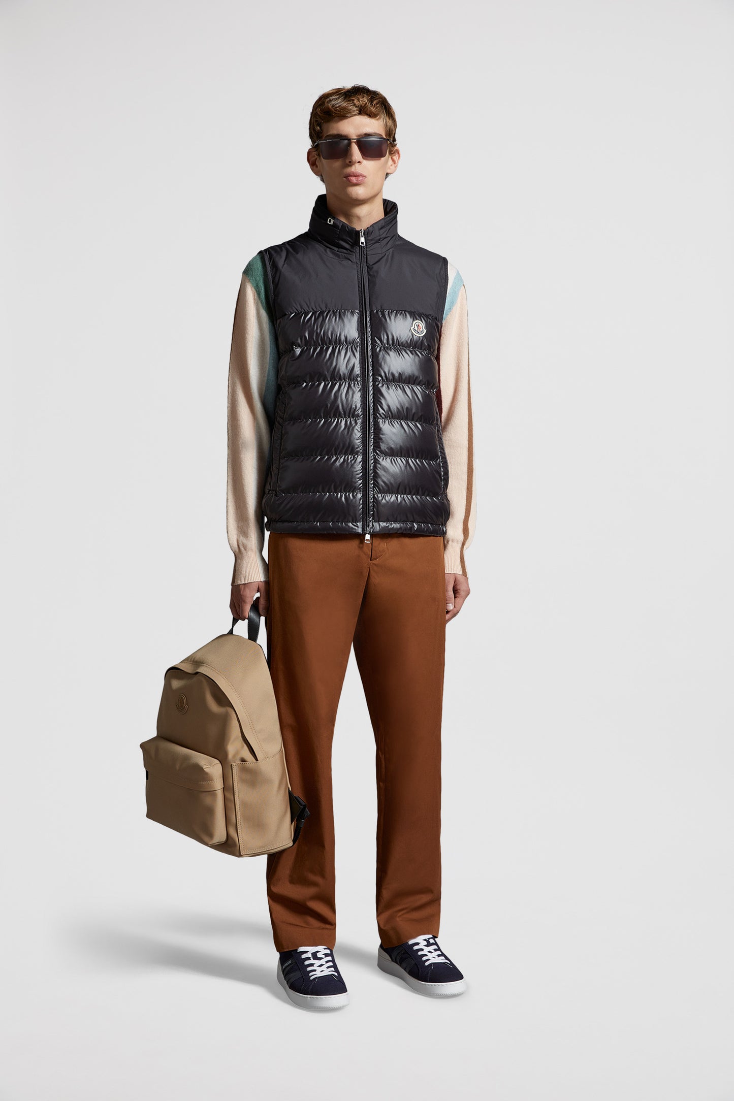 black sleeveless down jacket, luxury menswear, Moncler down jacket, high-end fashion, designer outerwear