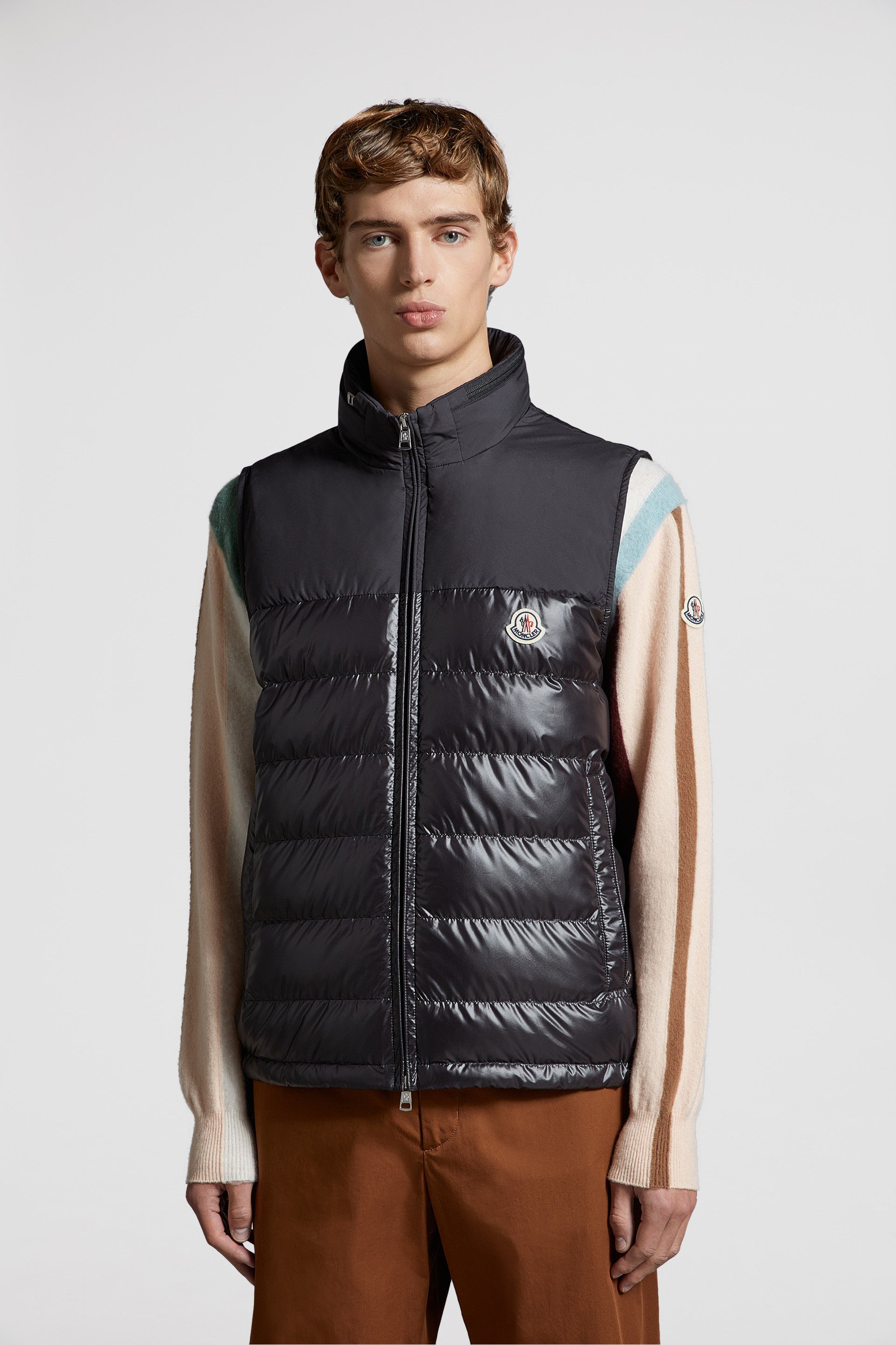 black sleeveless down jacket, luxury menswear, Moncler down jacket, high-end fashion, designer outerwear