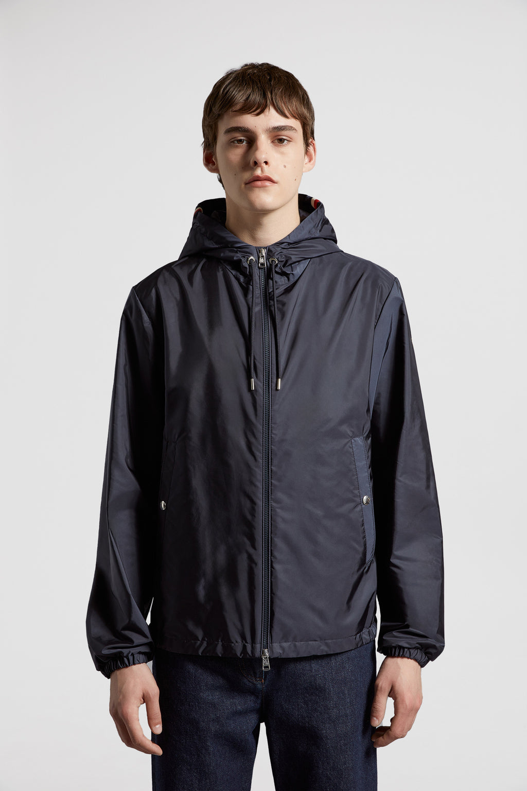 Moncler jacket, blue nylon jacket, luxury outerwear, fashion-forward, high-end jackets