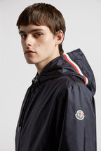 Moncler jacket, blue nylon jacket, luxury outerwear, fashion-forward, high-end jackets