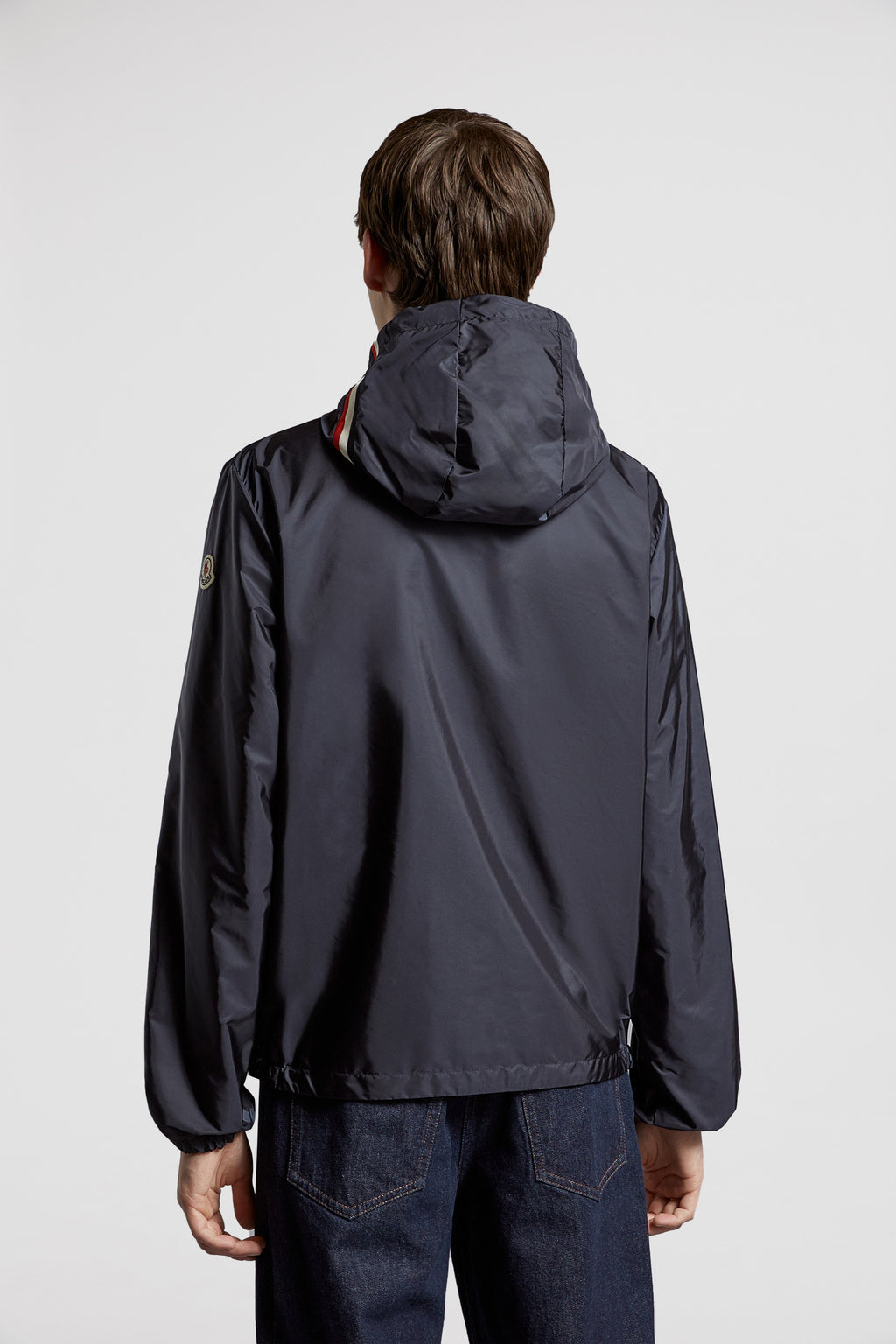 Moncler jacket, blue nylon jacket, luxury outerwear, fashion-forward, high-end jackets