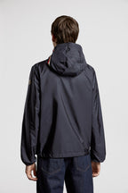 Moncler jacket, blue nylon jacket, luxury outerwear, fashion-forward, high-end jackets