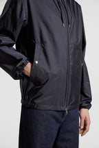 Moncler jacket, blue nylon jacket, luxury outerwear, fashion-forward, high-end jackets