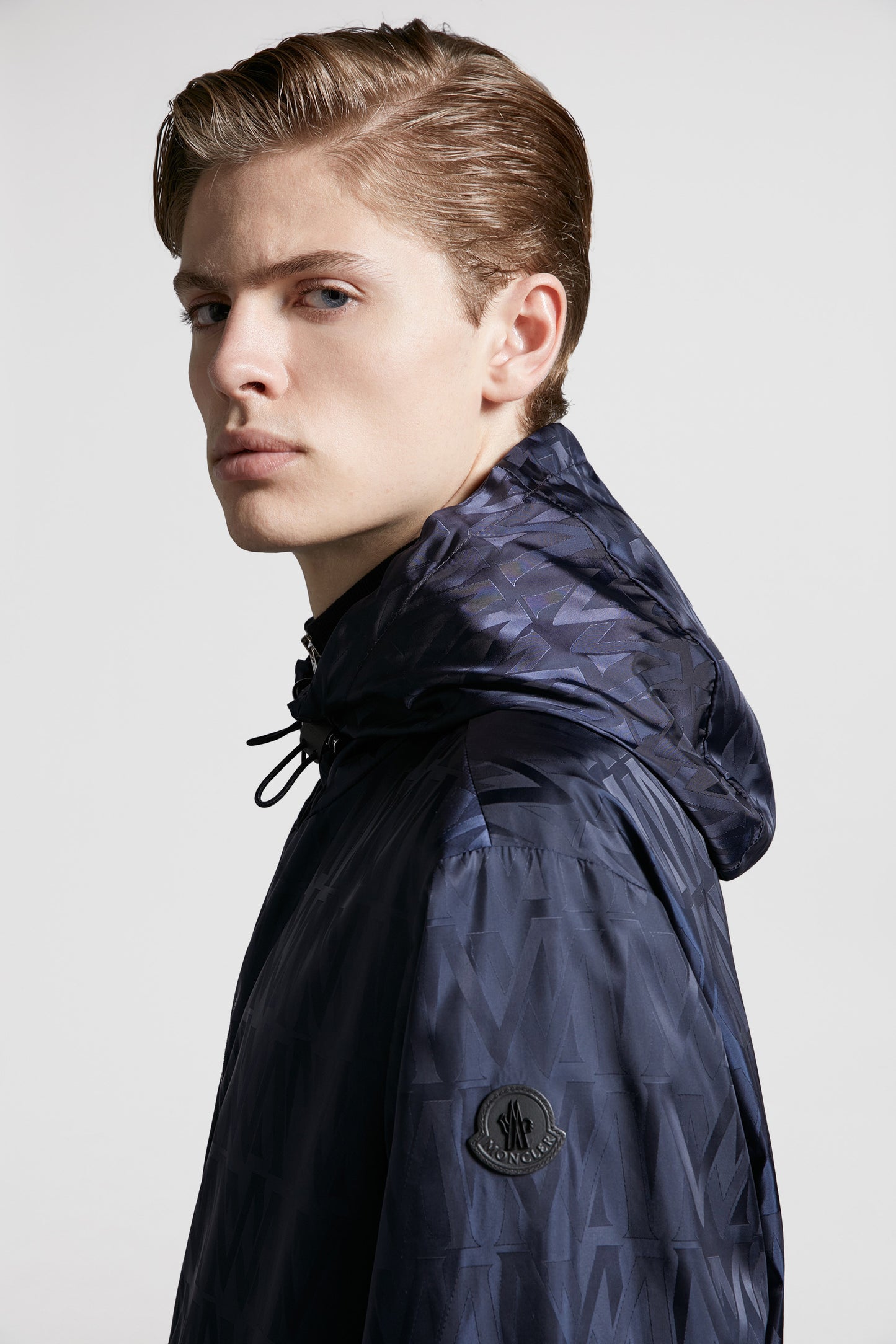 Moncler windbreaker, reversible jacket, luxury outerwear, versatile fashion, designer windbreaker