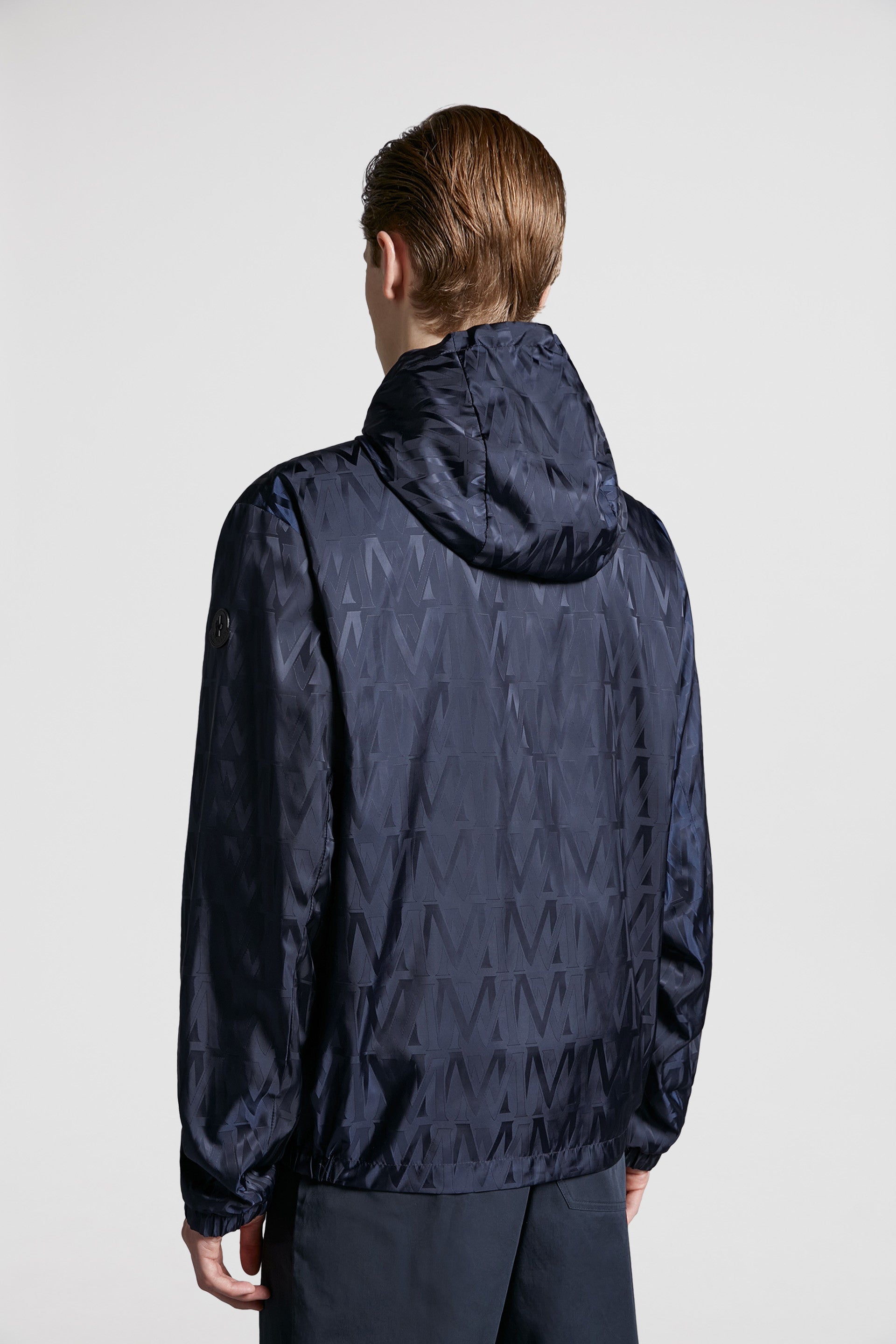 Moncler windbreaker, reversible jacket, luxury outerwear, versatile fashion, designer windbreaker