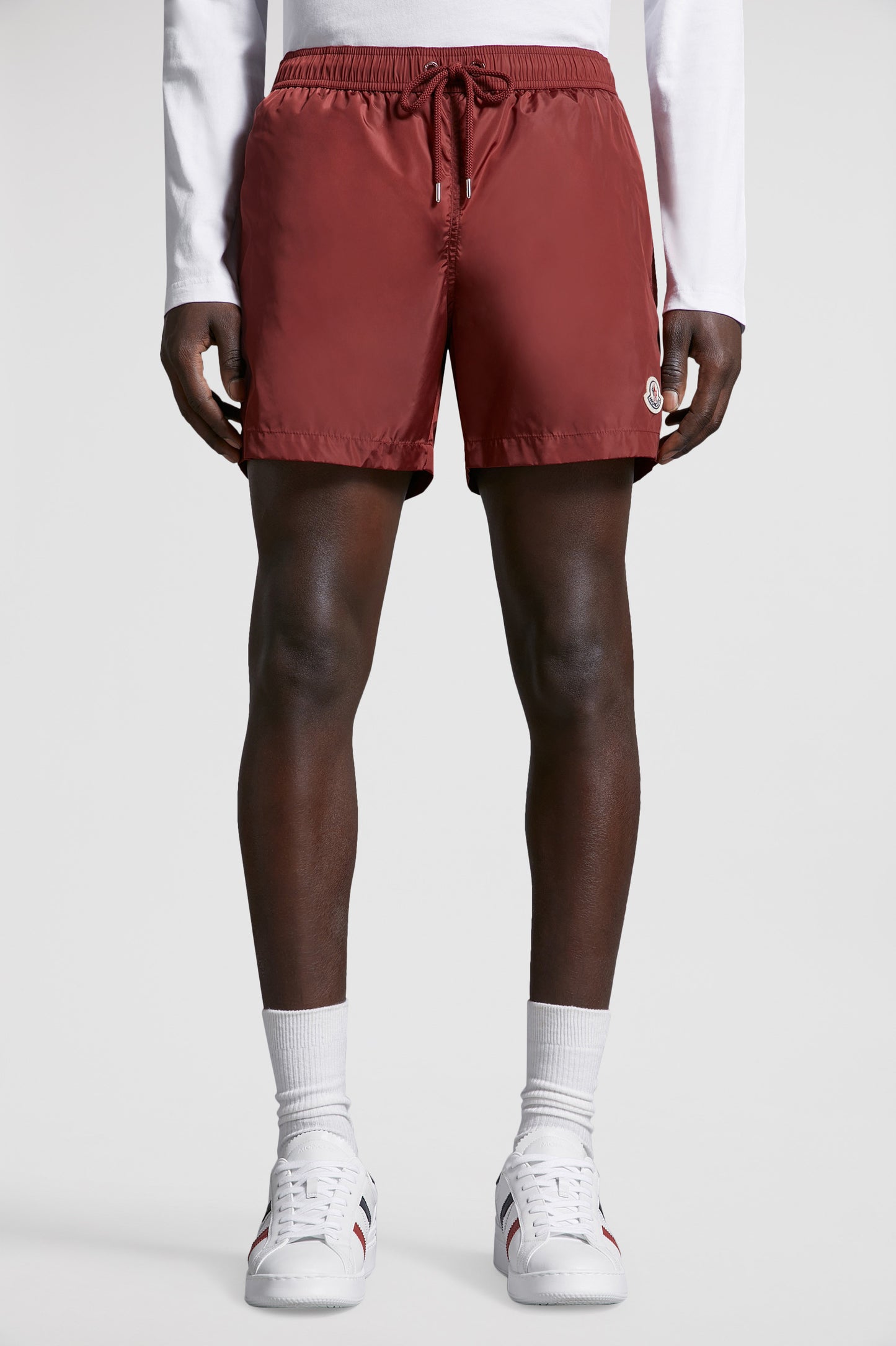 moncler swim shorts, burgundy logo shorts, luxury swimwear, premium swim shorts, high-end beachwear