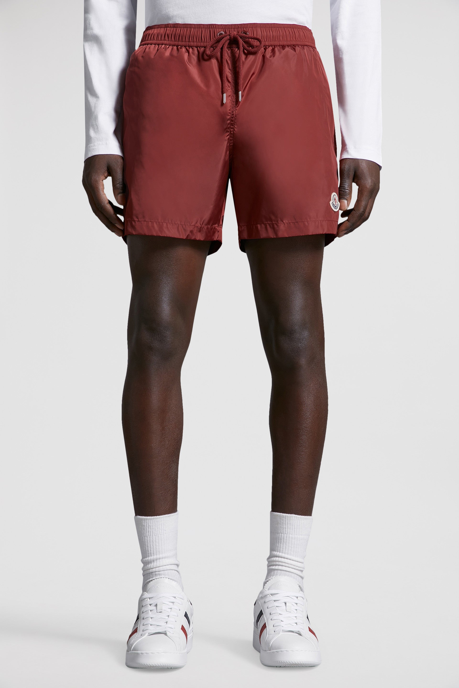 moncler swim shorts, burgundy logo shorts, luxury swimwear, premium swim shorts, high-end beachwear