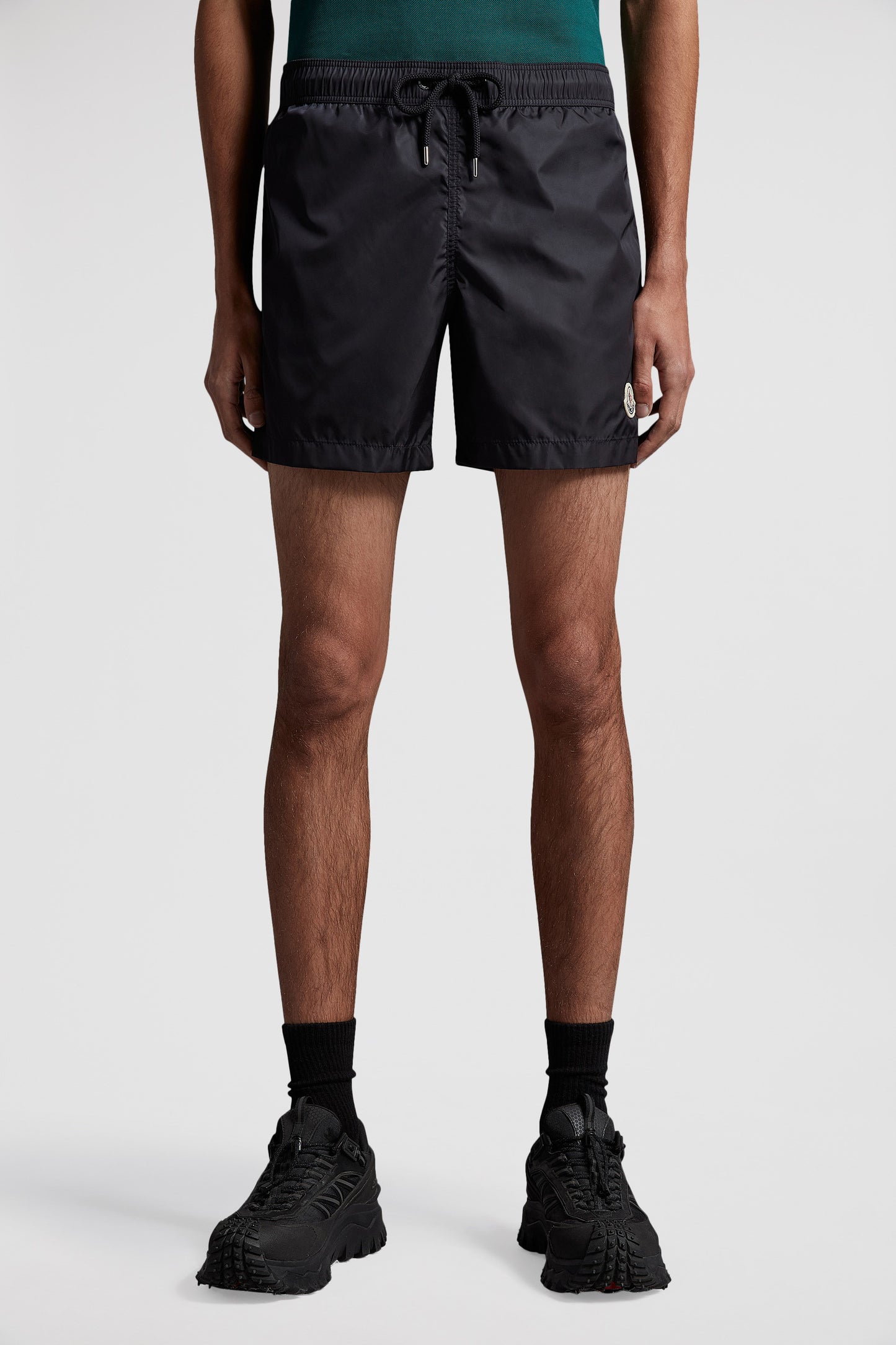 Moncler swim shorts, blue swim shorts, luxury beachwear, high-end swimwear, designer swim shorts