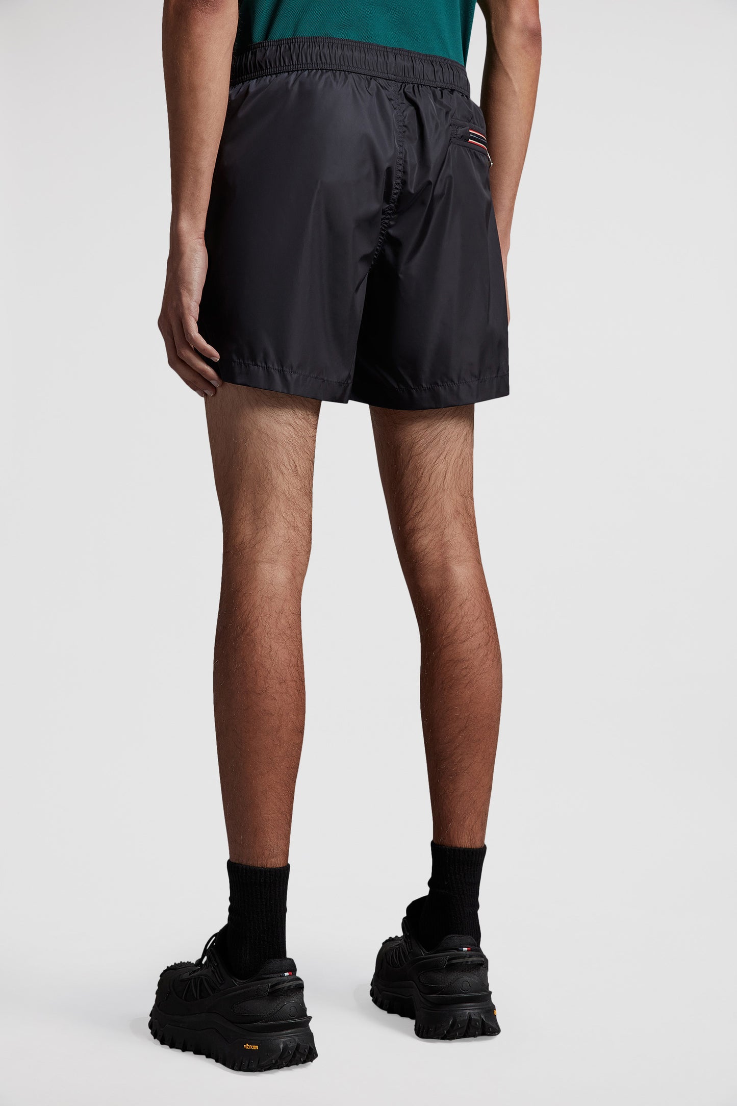 Moncler swim shorts, blue swim shorts, luxury beachwear, high-end swimwear, designer swim shorts