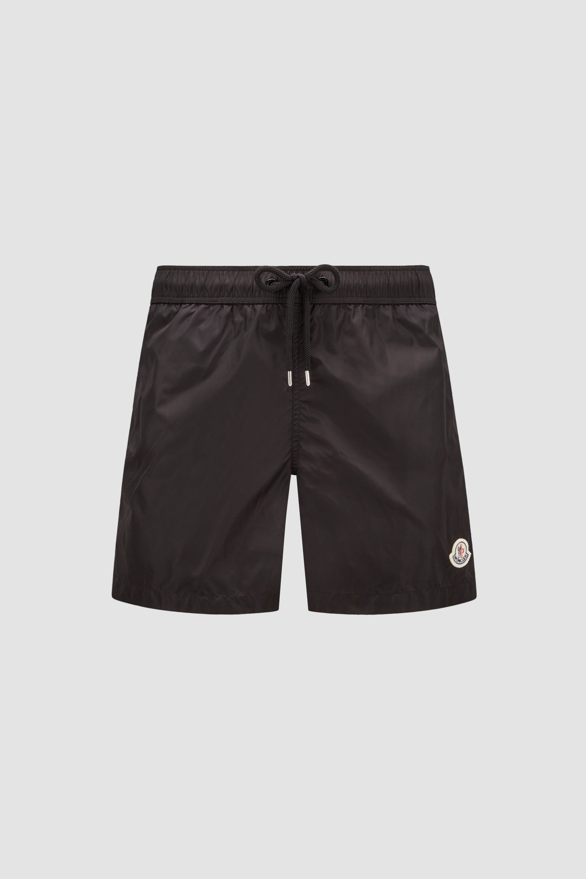 Moncler swim shorts, black swim shorts, luxury swimwear, designer swimwear, logo shorts