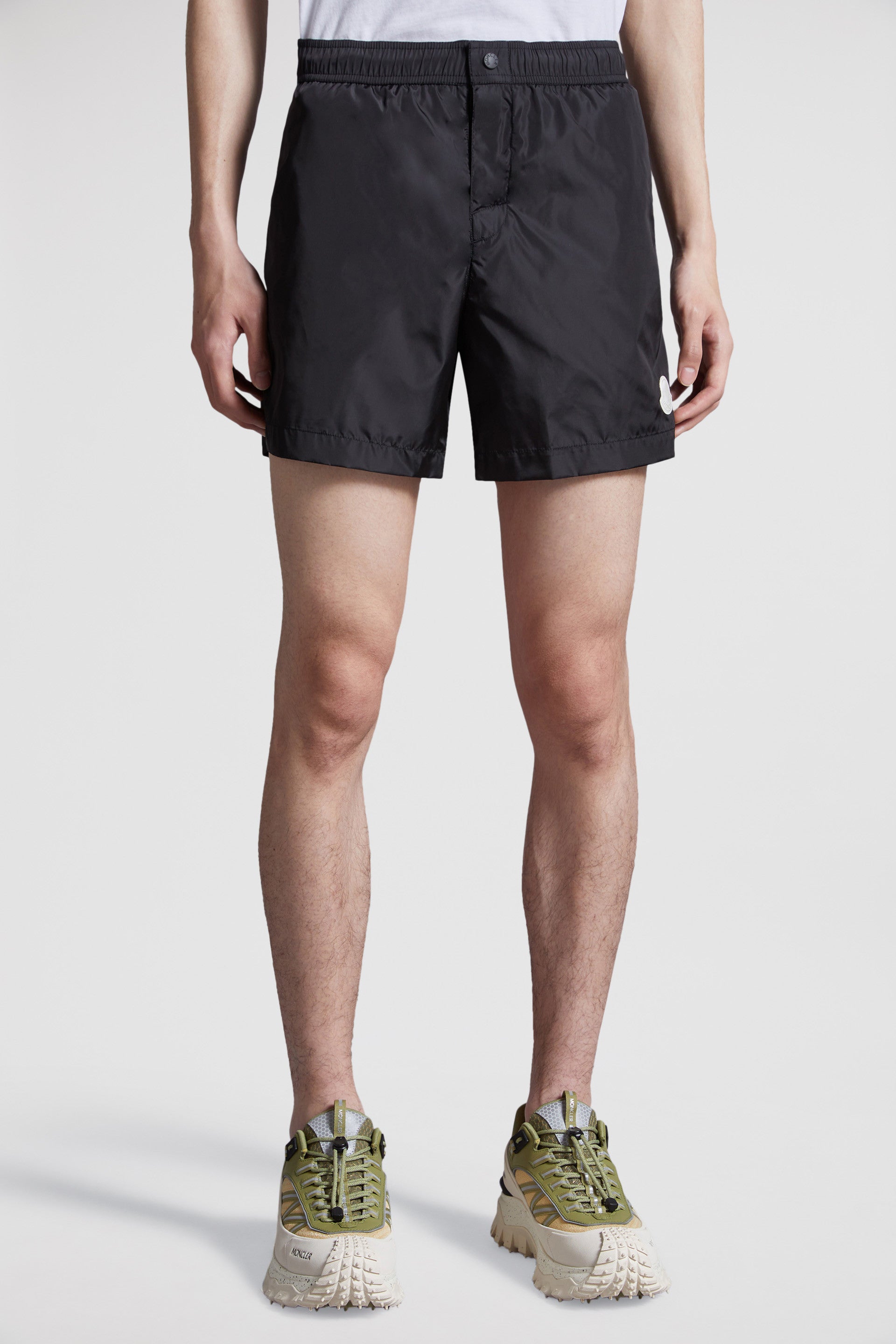 swim shorts, luxury swimwear, black swim shorts, Moncler swimwear, designer swimwear