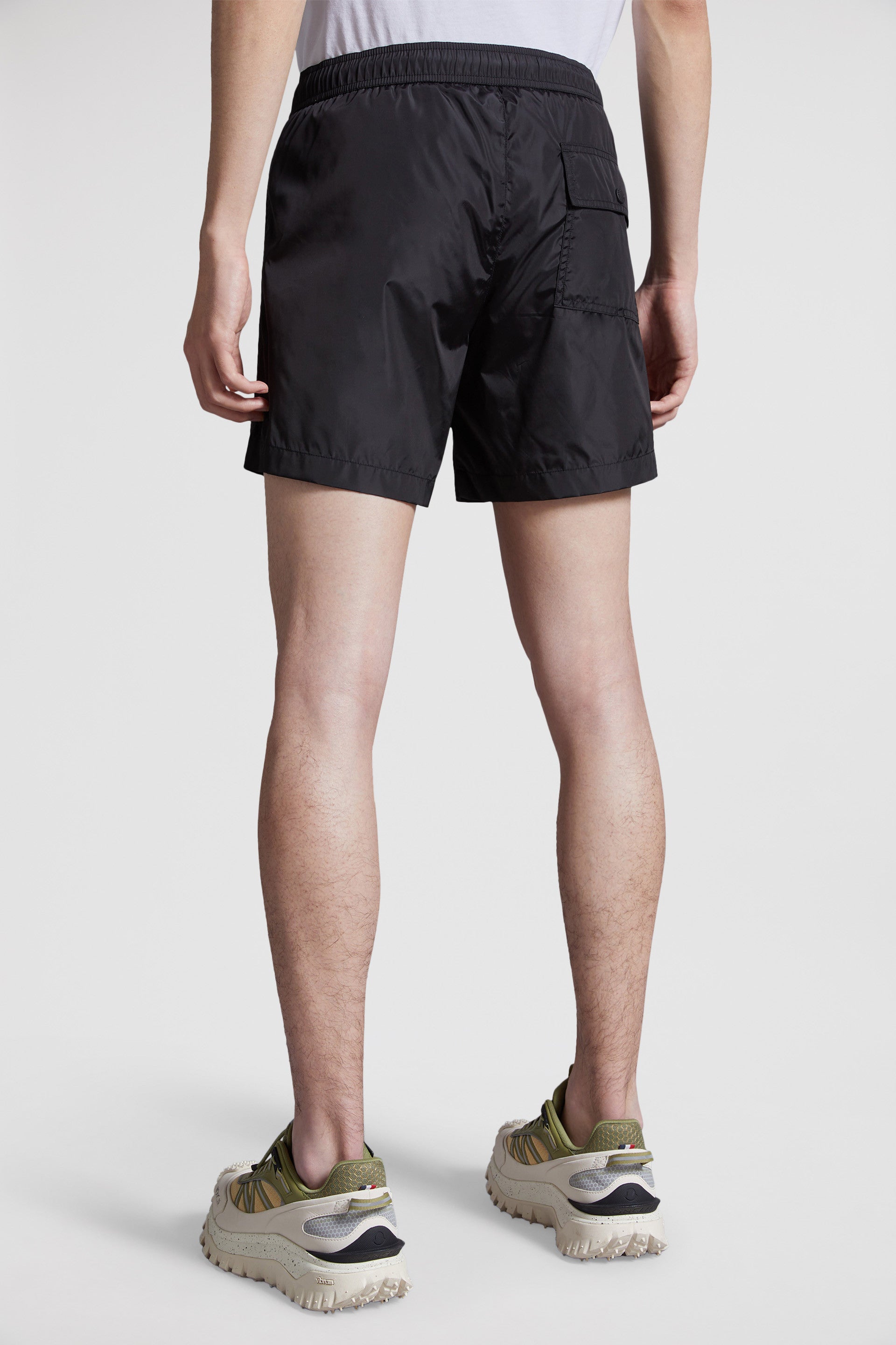 swim shorts, luxury swimwear, black swim shorts, Moncler swimwear, designer swimwear