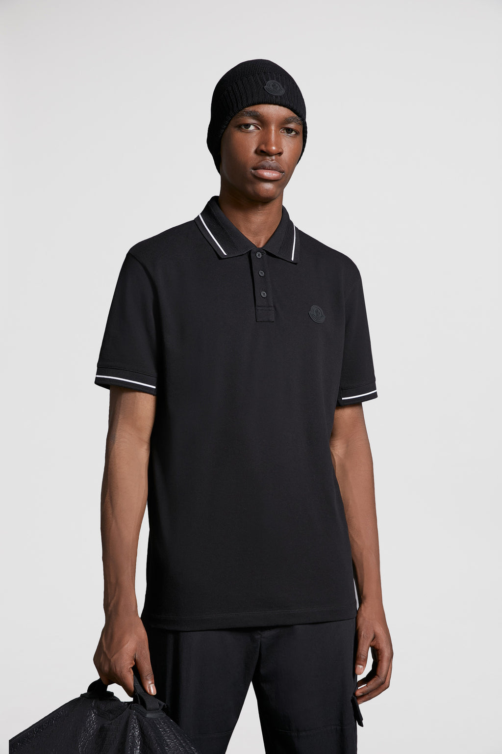 Moncler, black polo, luxury polo, logo trim, designer menswear
