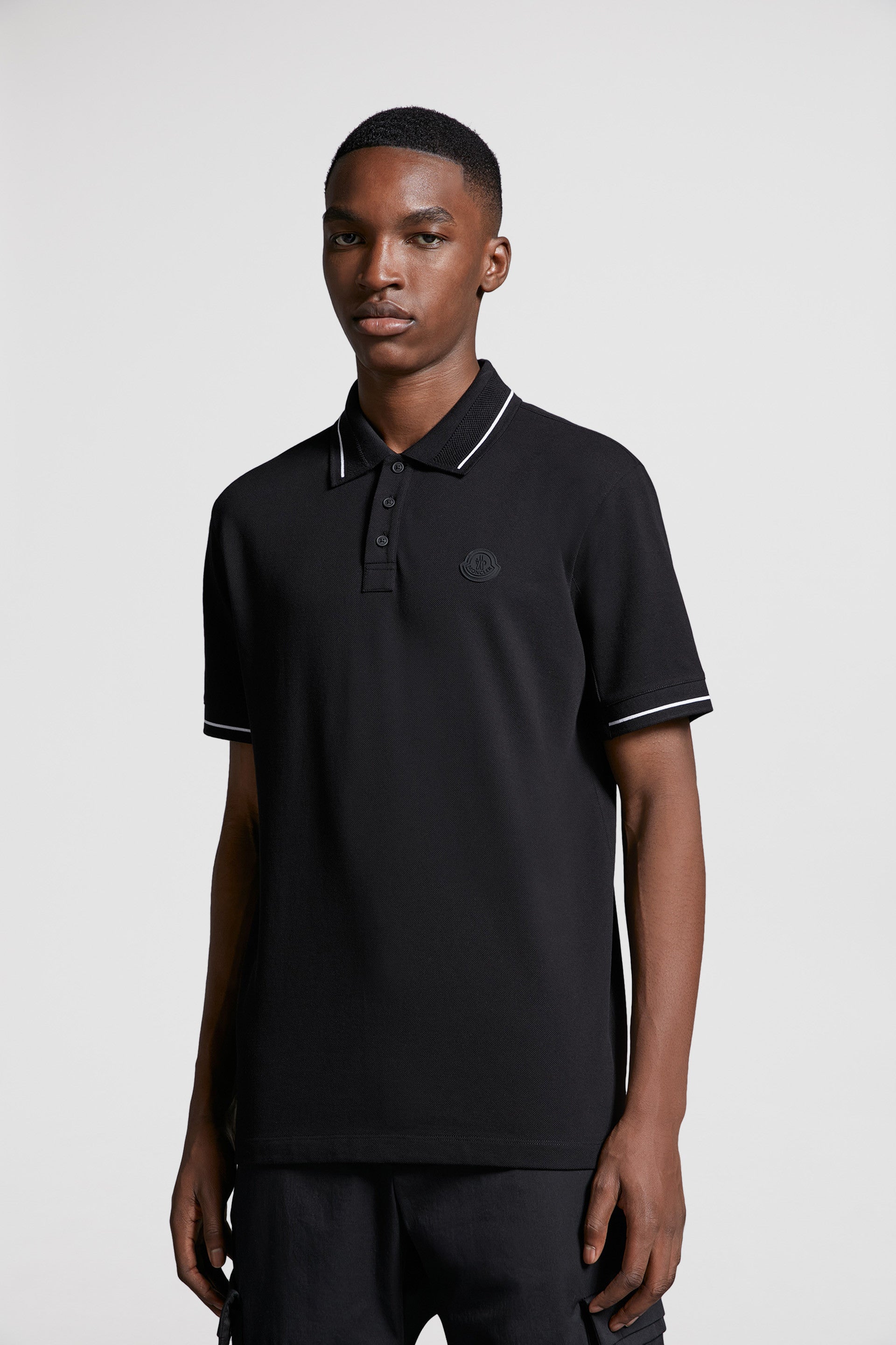 Moncler, black polo, luxury polo, logo trim, designer menswear