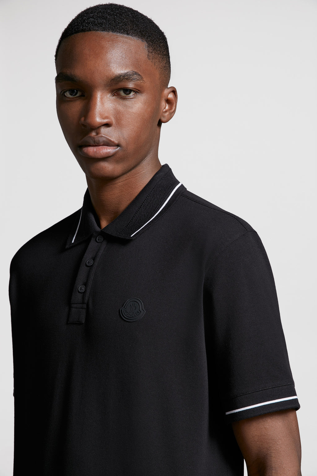 Moncler, black polo, luxury polo, logo trim, designer menswear