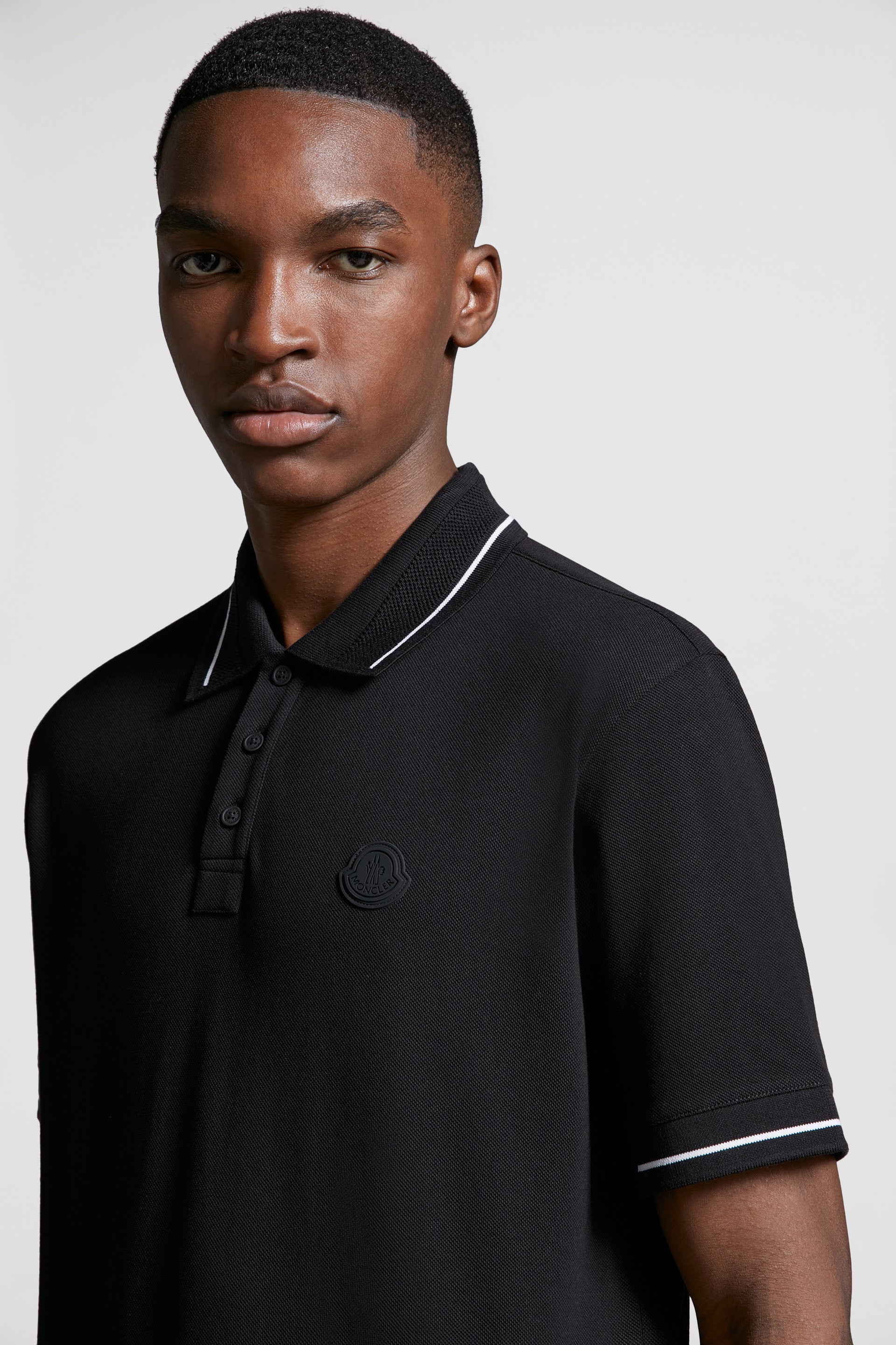 Moncler, black polo, luxury polo, logo trim, designer menswear