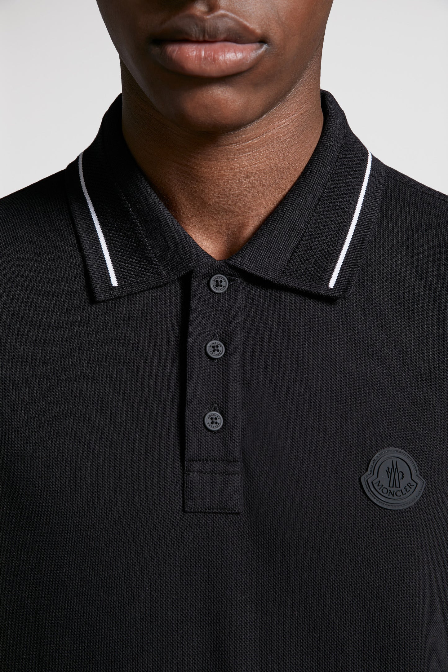 Moncler, black polo, luxury polo, logo trim, designer menswear