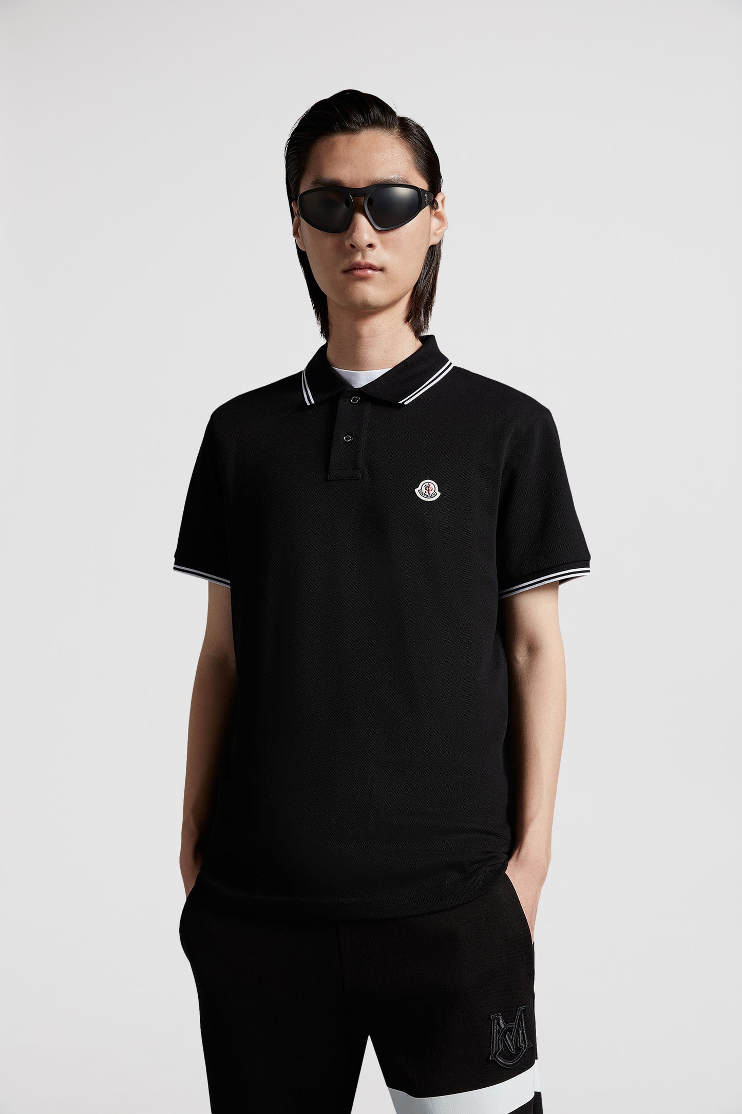 Luxury polo shirt, Black polo with trims, Moncler polo, High-end casual wear, Timeless menswear