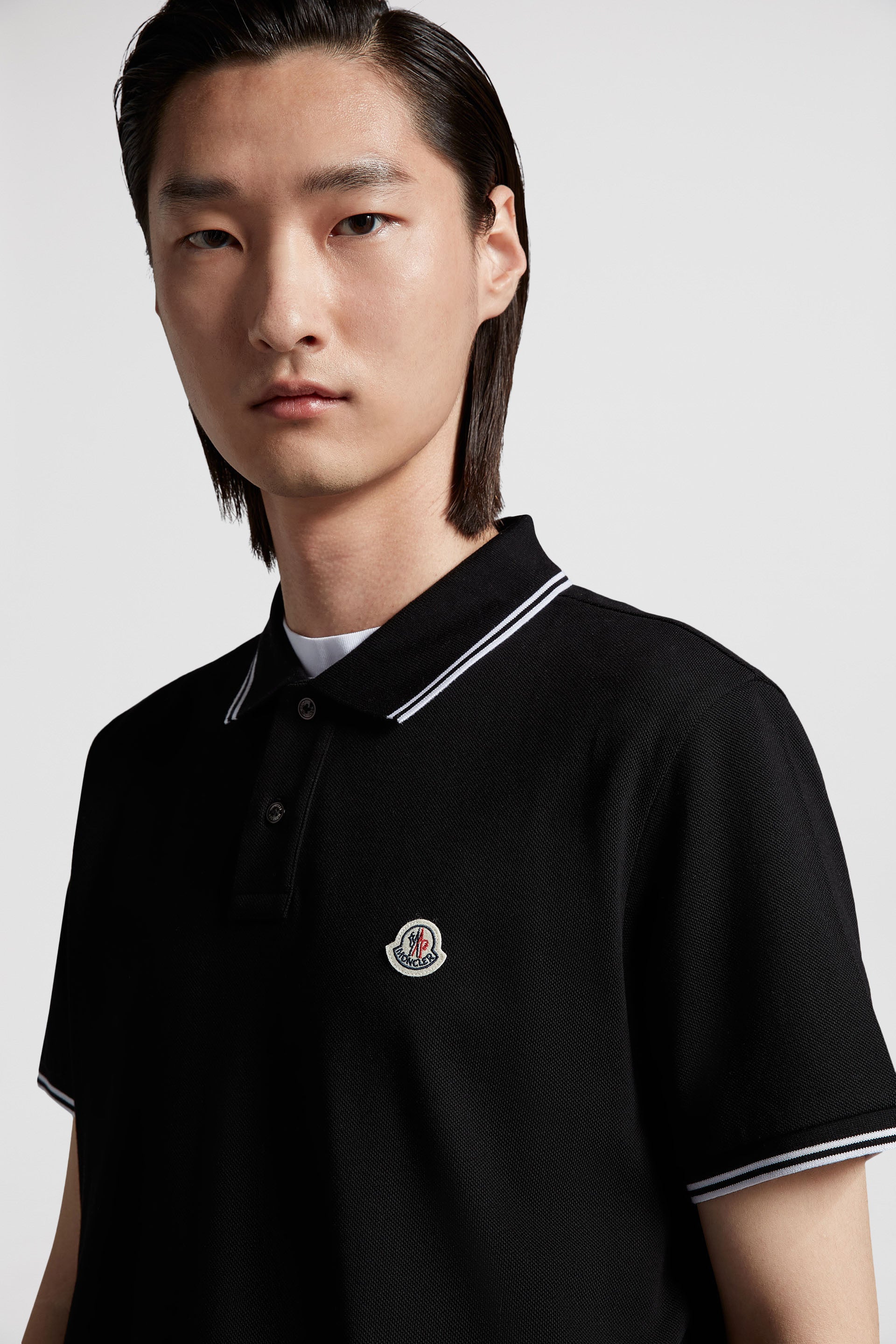 Luxury polo shirt, Black polo with trims, Moncler polo, High-end casual wear, Timeless menswear