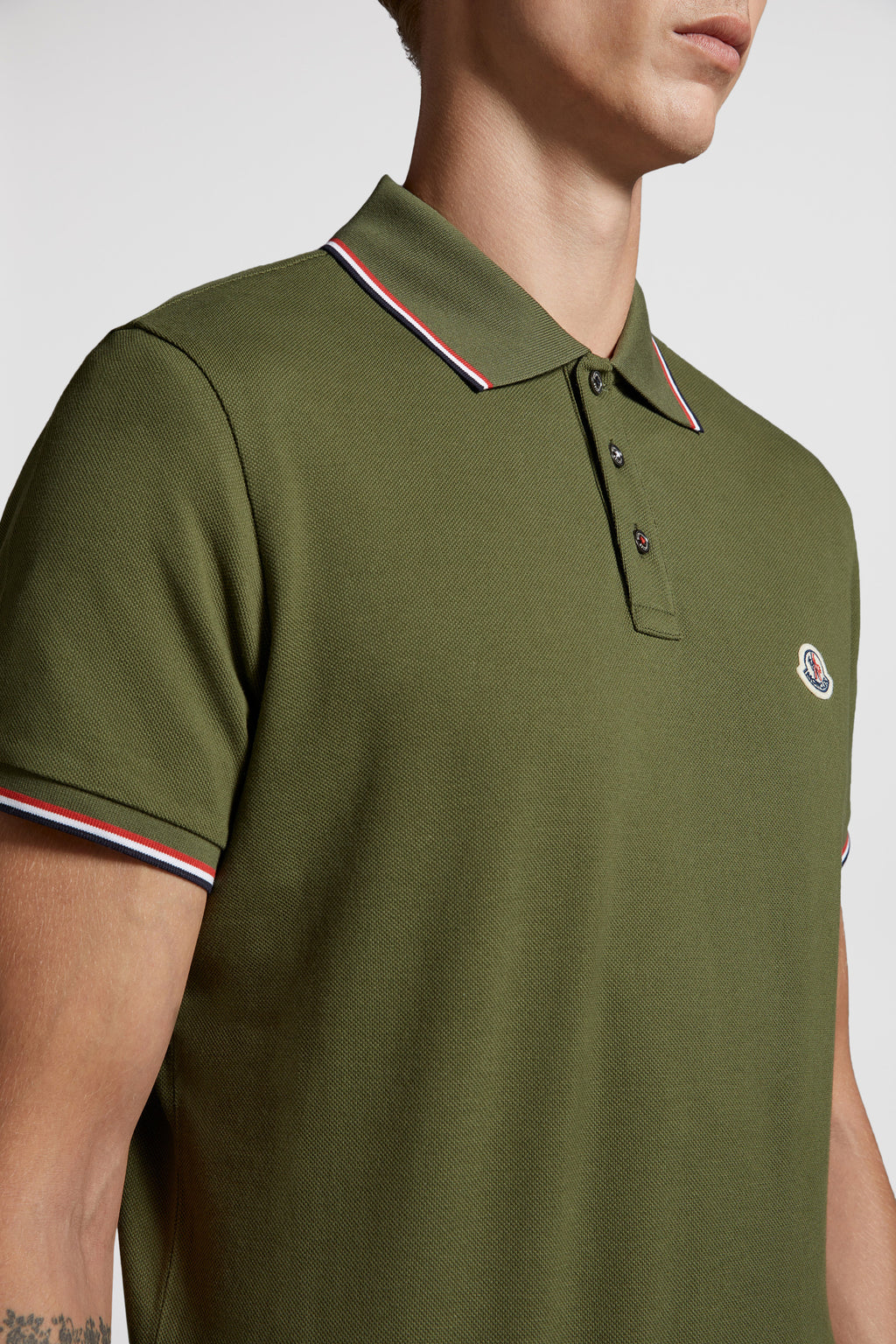 Polo shirt, khaki polo, Moncler, luxury men’s wear, elegant casual wear