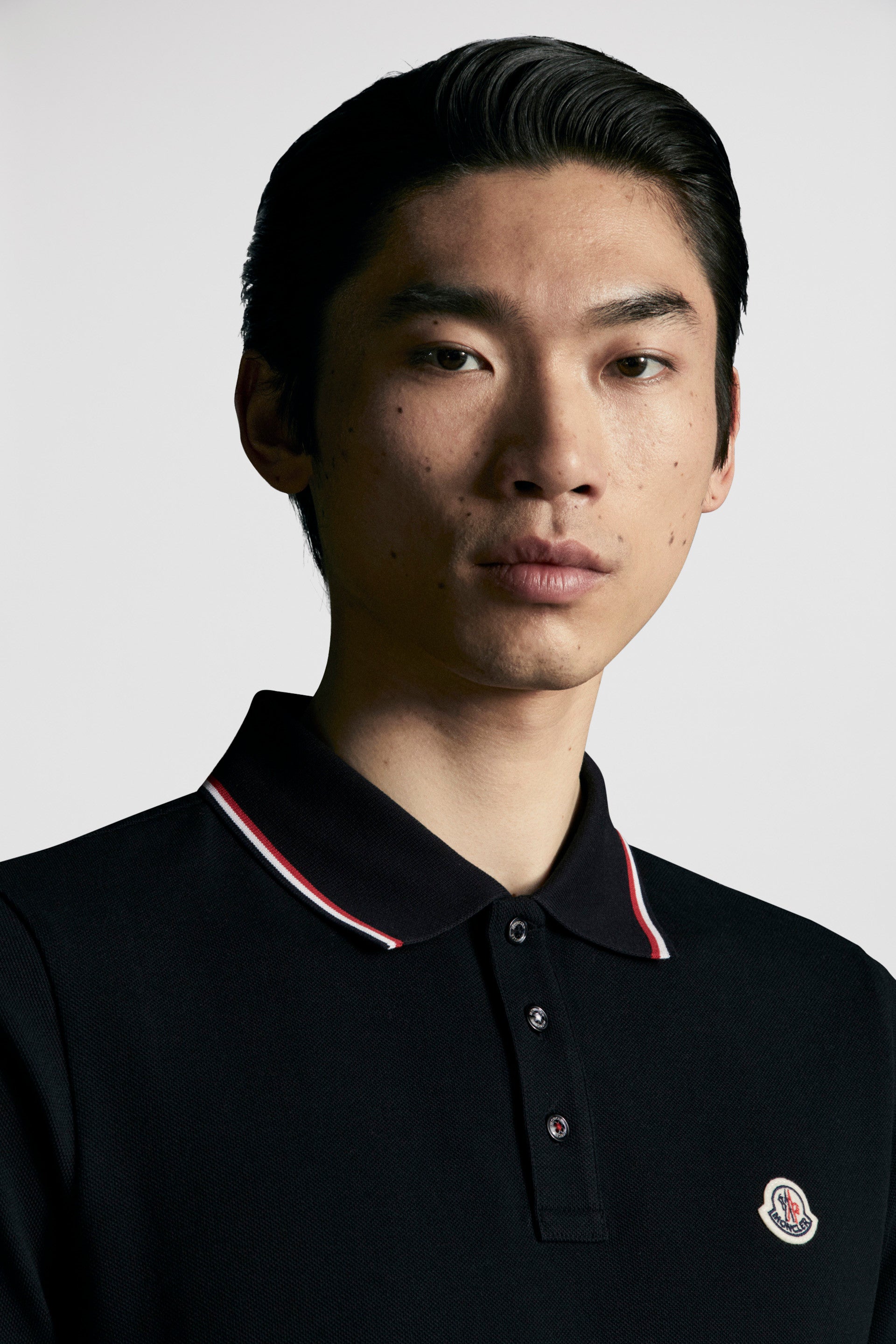 black polo, Moncler polo, luxury polo shirt, embroidered polo, designer menswear