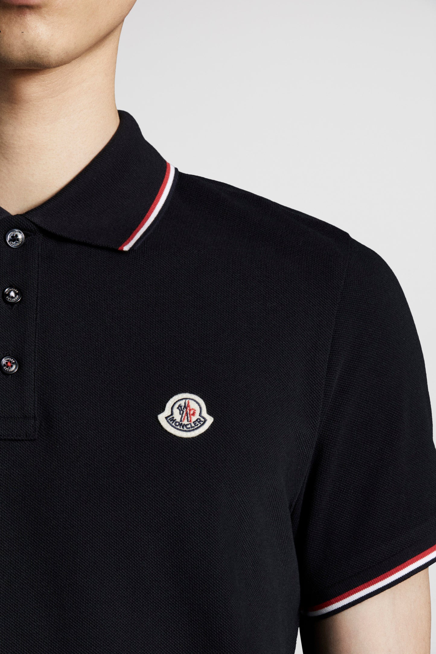 black polo, Moncler polo, luxury polo shirt, embroidered polo, designer menswear