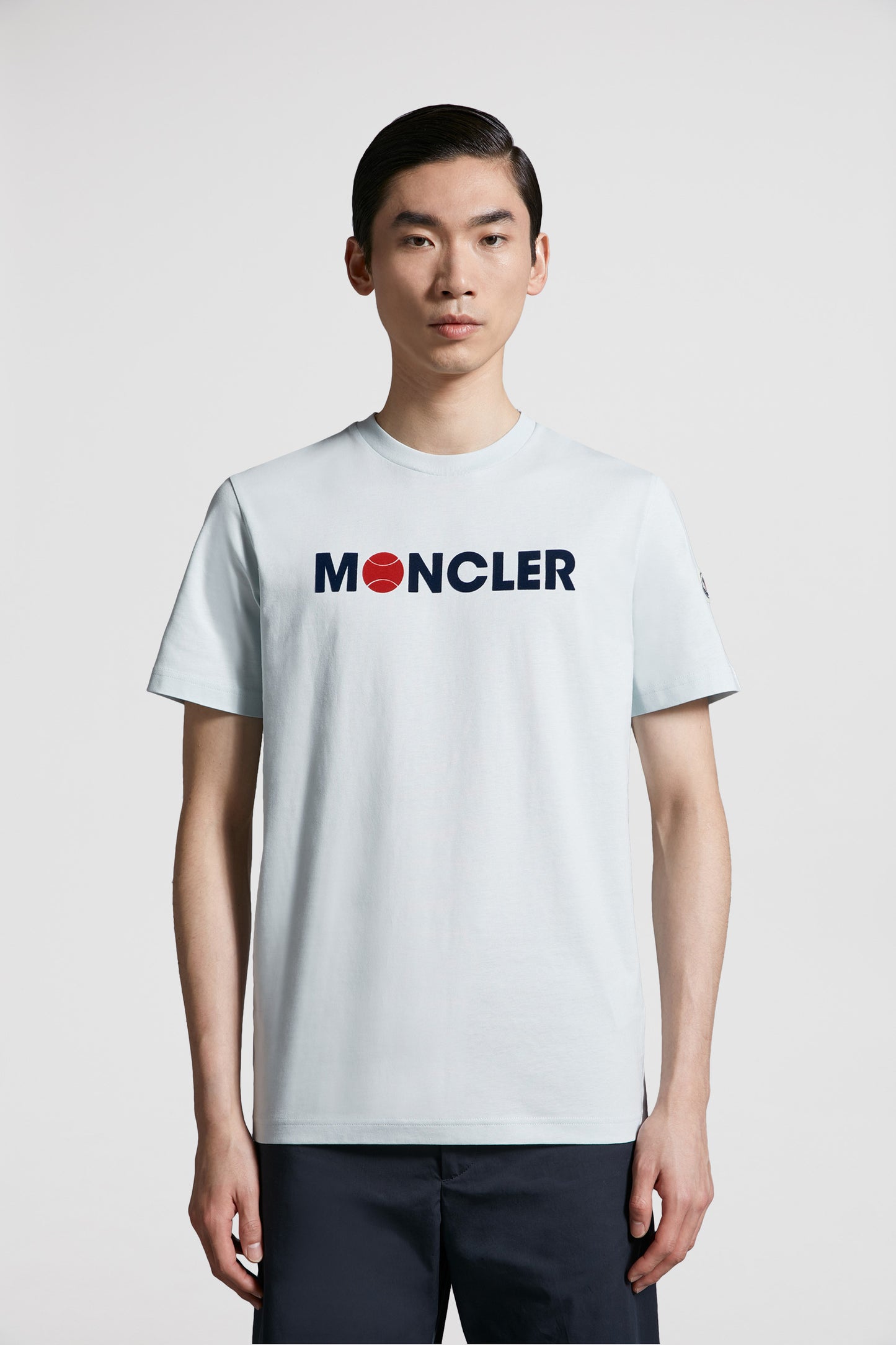 luxury t-shirt, Moncler tee, light blue t-shirt, designer logos, high-end fashion