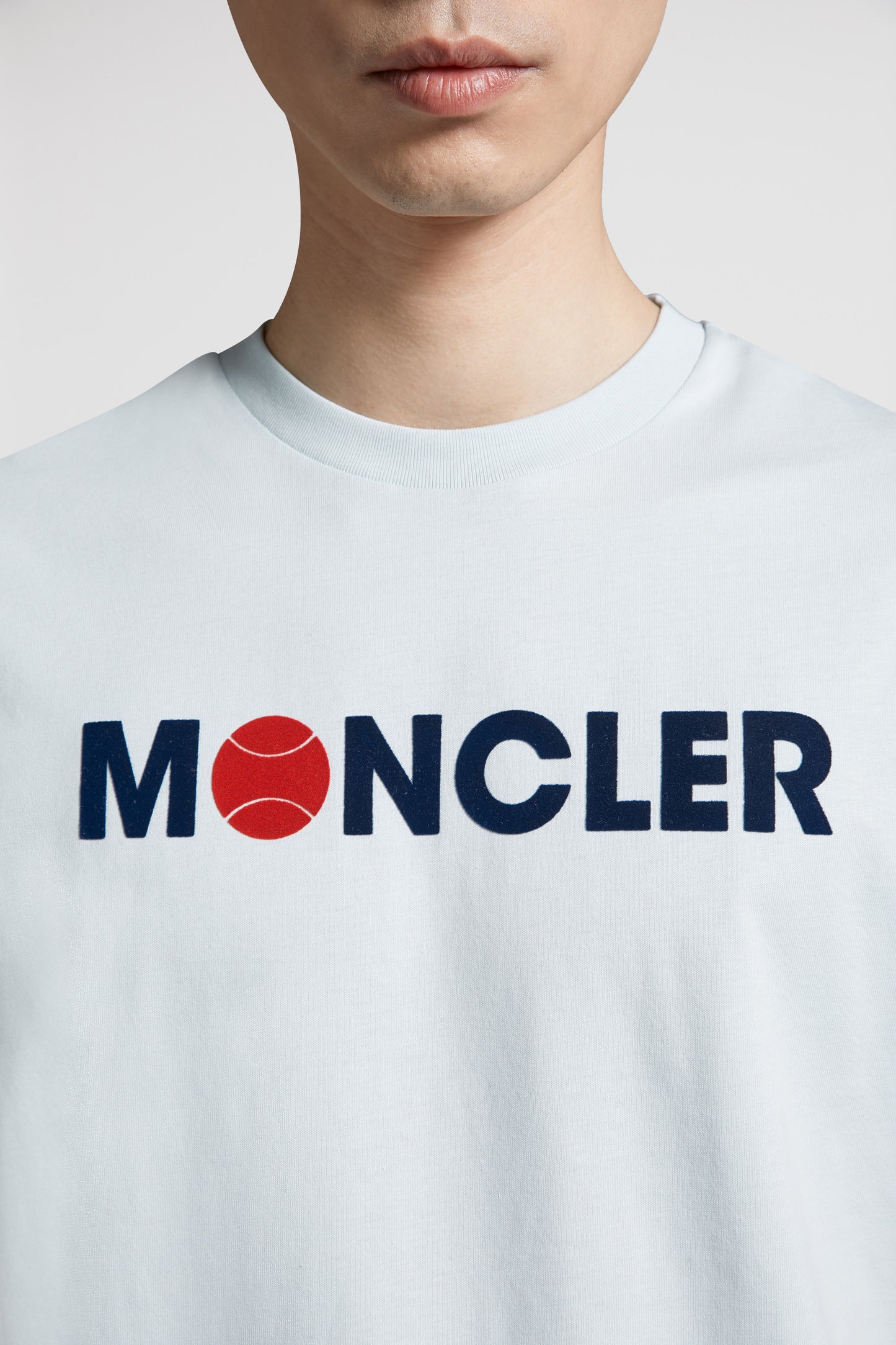 luxury t-shirt, Moncler tee, light blue t-shirt, designer logos, high-end fashion