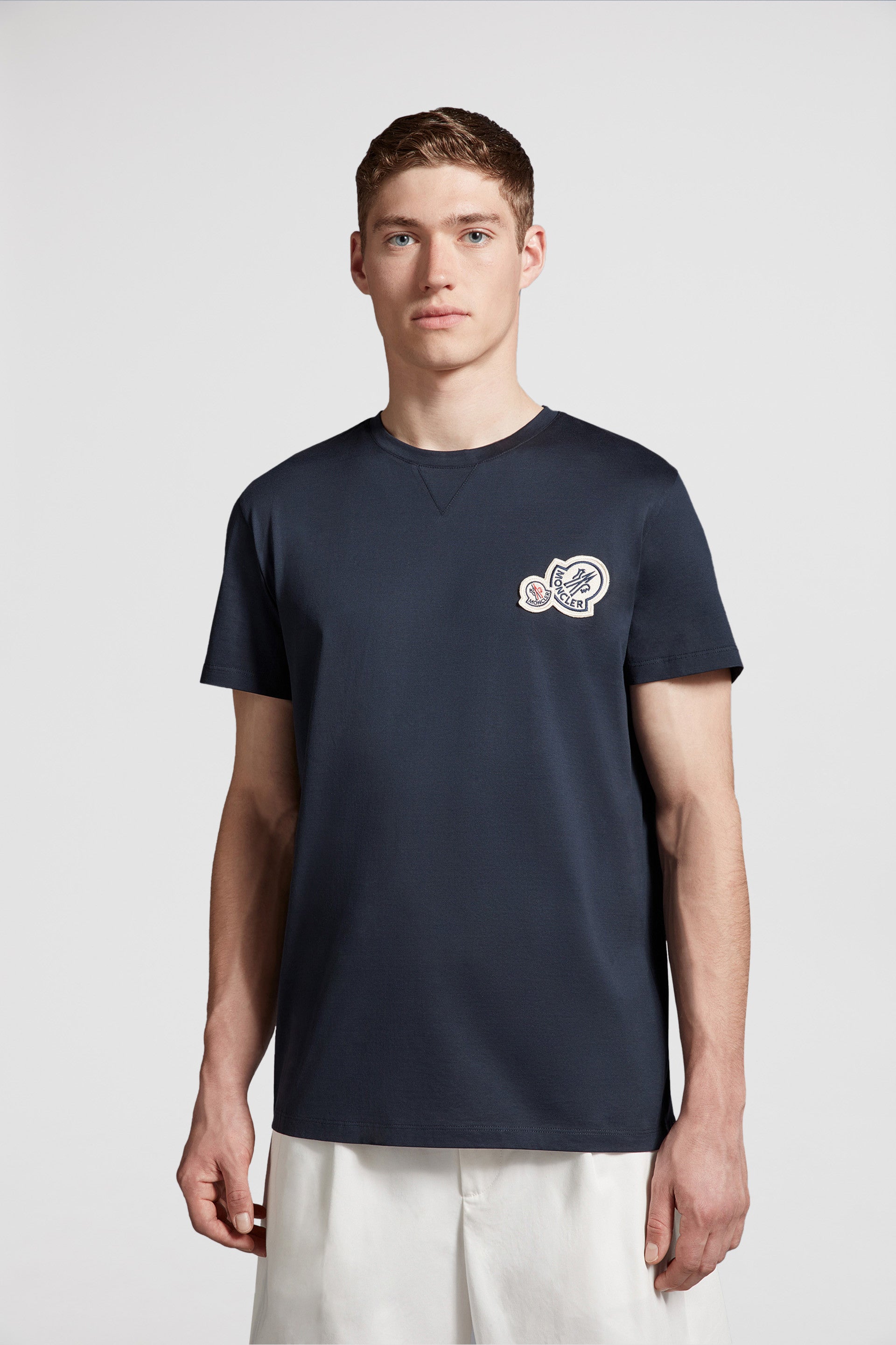 Moncler logo T-shirt,luxury blue T-shirt,designer casual wear,high-end fashion,exclusive men's apparel